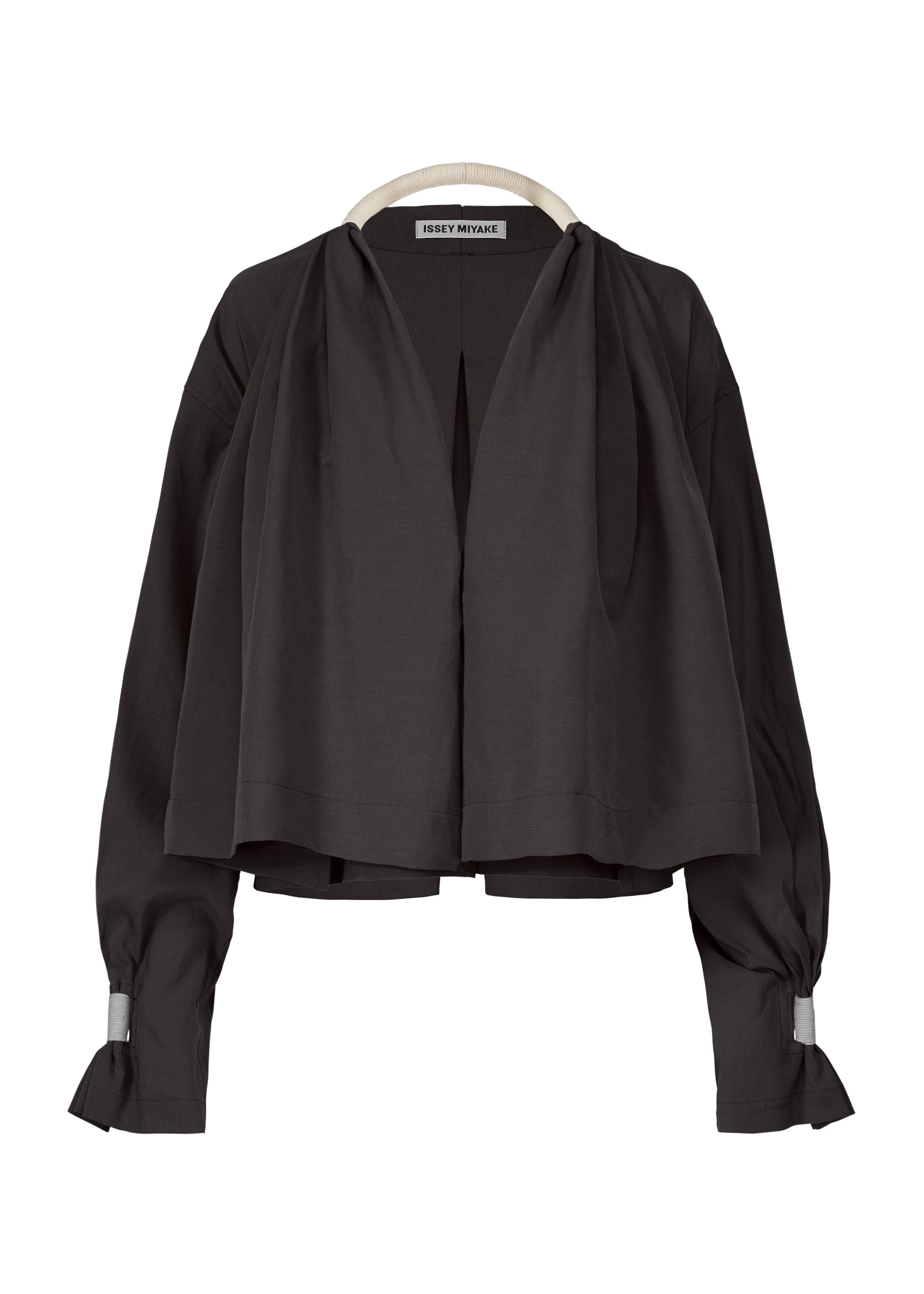 A product shot of the ISSEY MIYAKE CLOTH AND CORD cardigan in .