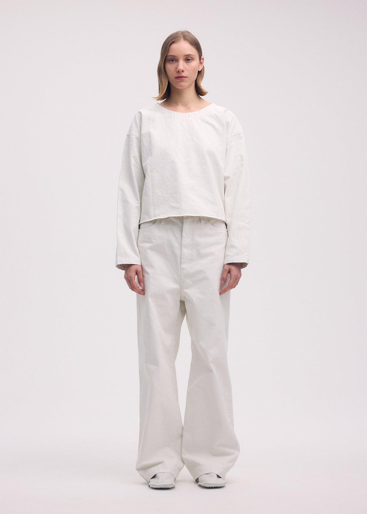 A model wears the ISSEY MIYAKE SCULPTURAL (BAG) bag.