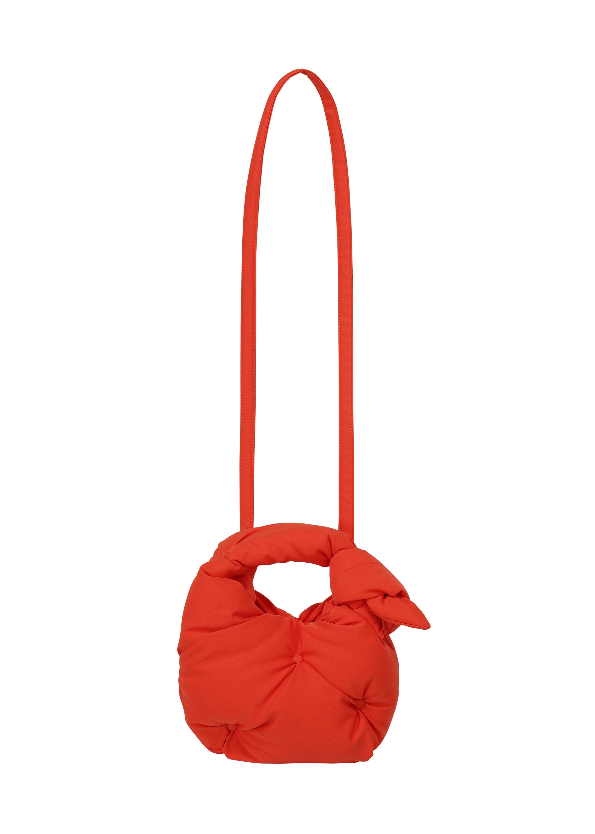 A detail shot of the ISSEY MIYAKE PUMPED BAG bag.
