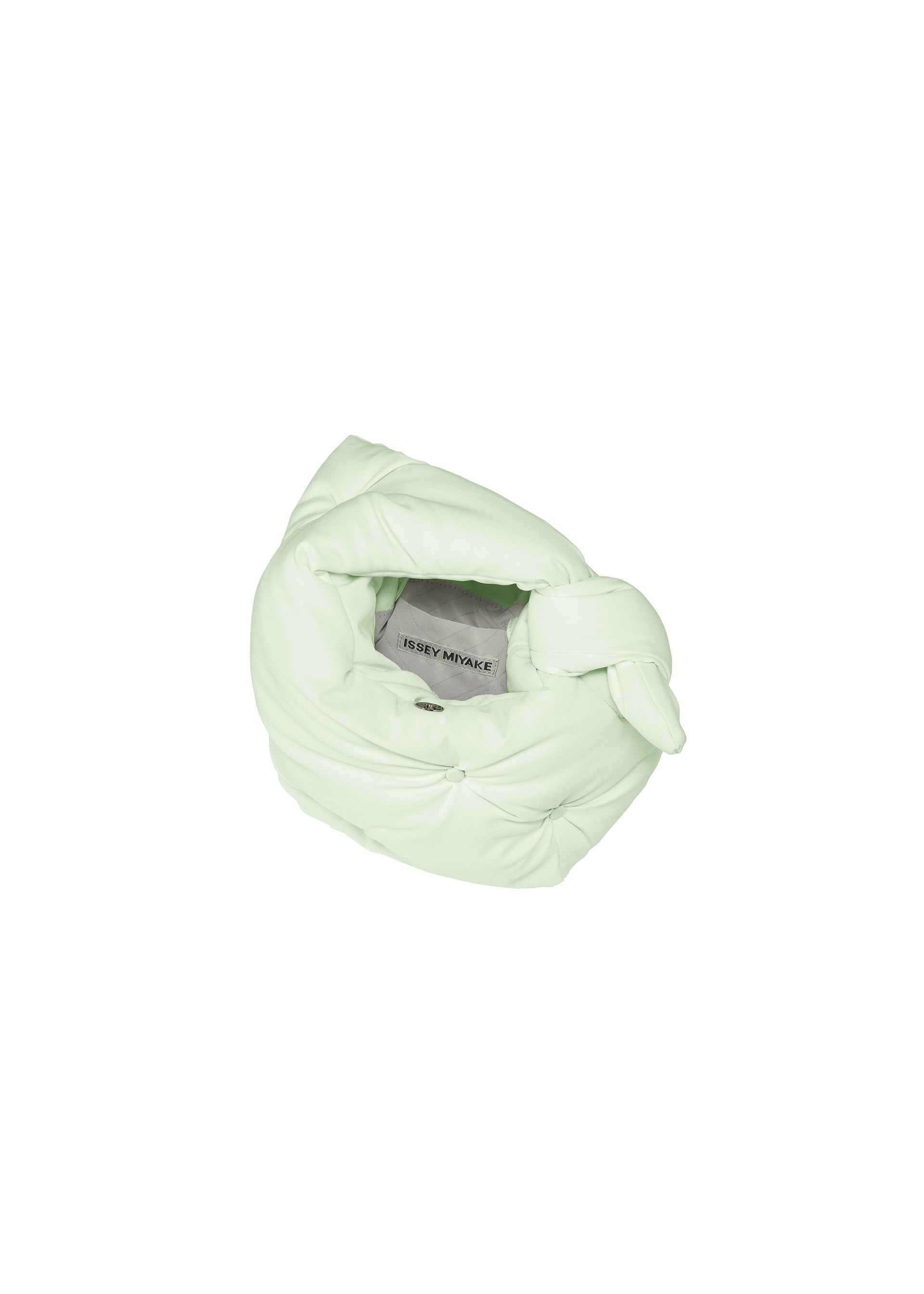 A detail shot of the ISSEY MIYAKE PUMPED BAG bag.