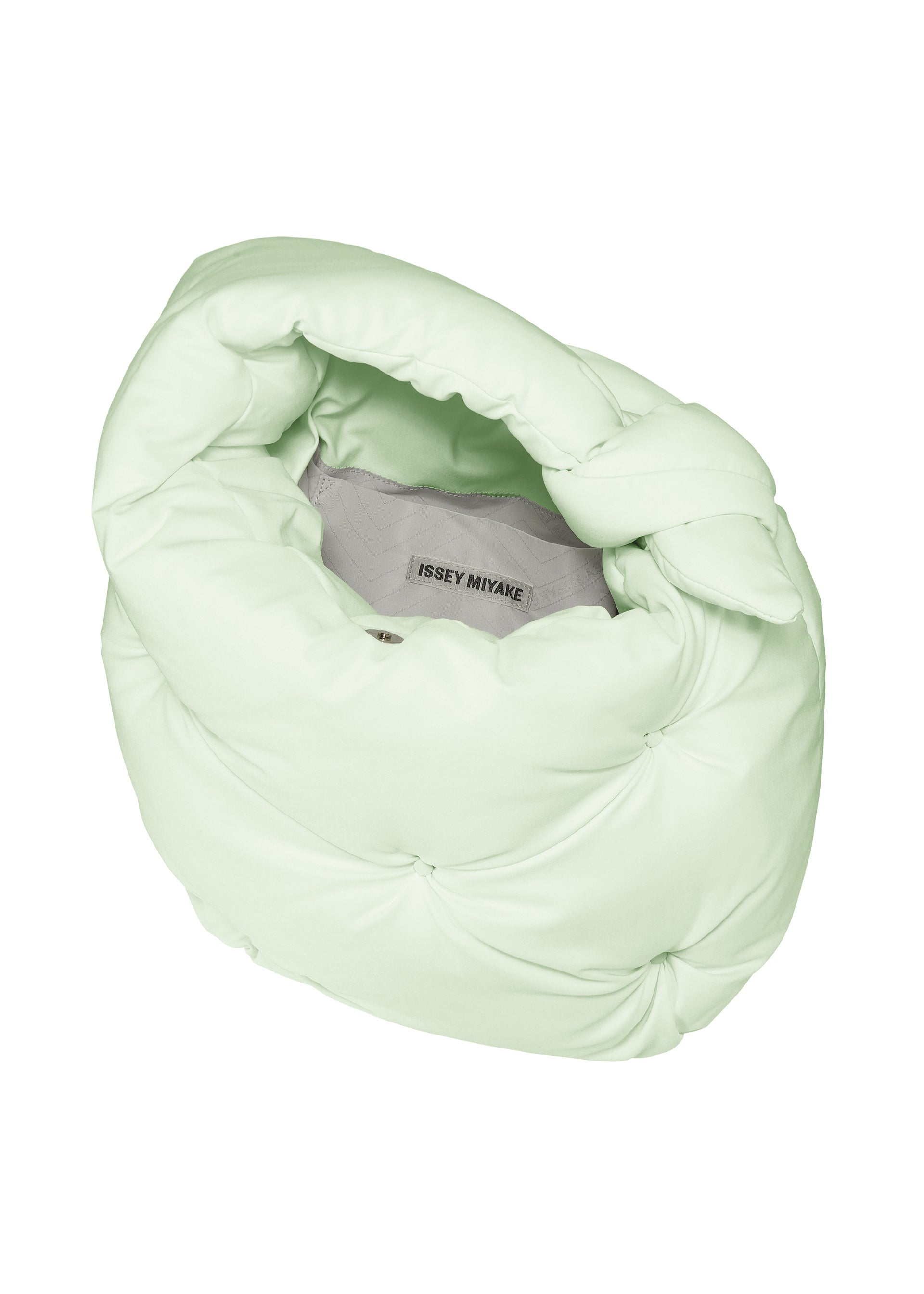 A detail shot of the ISSEY MIYAKE PUMPED BAG bag.