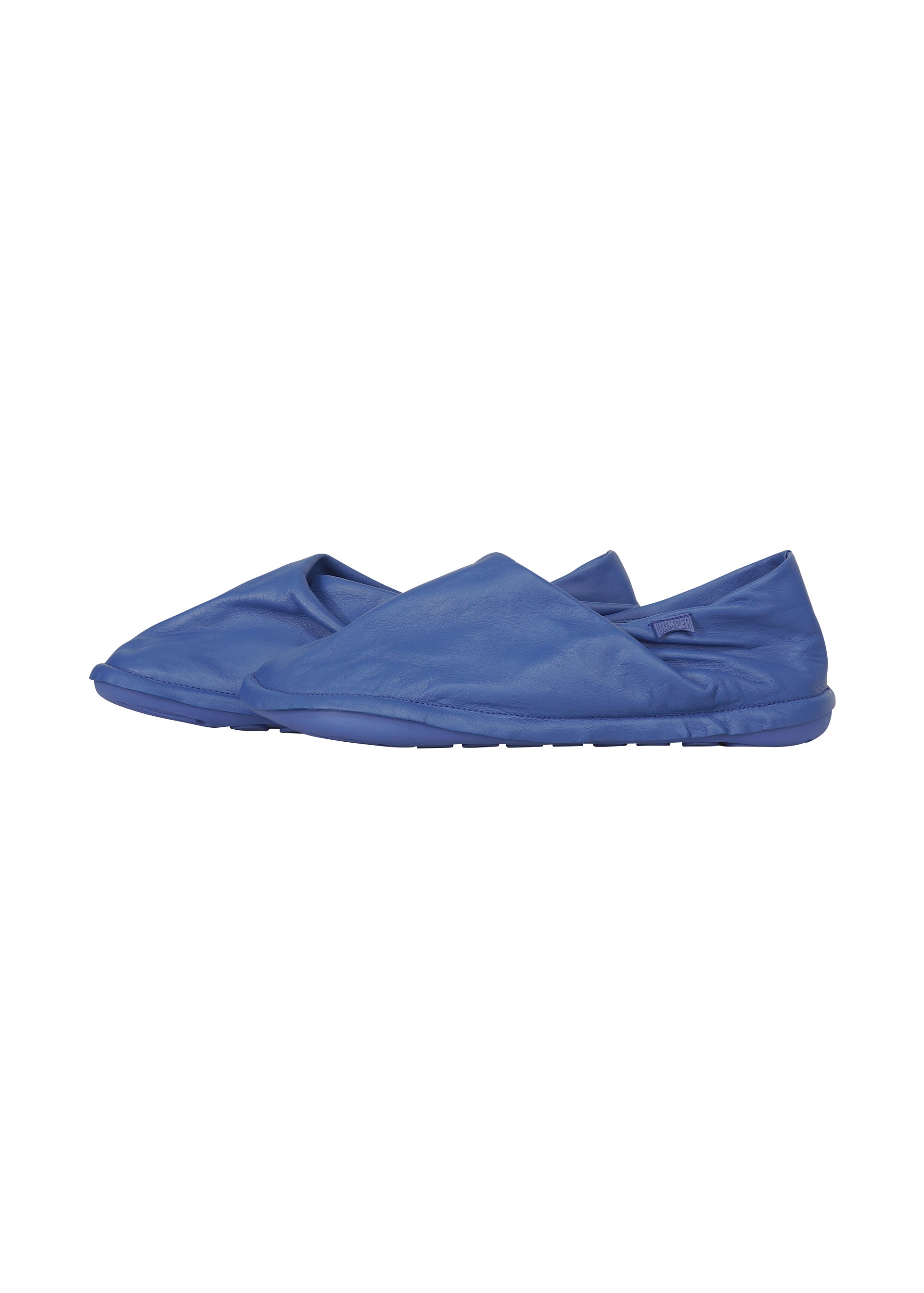 A detail shot of the ISSEY MIYAKE PEU FORM shoes.