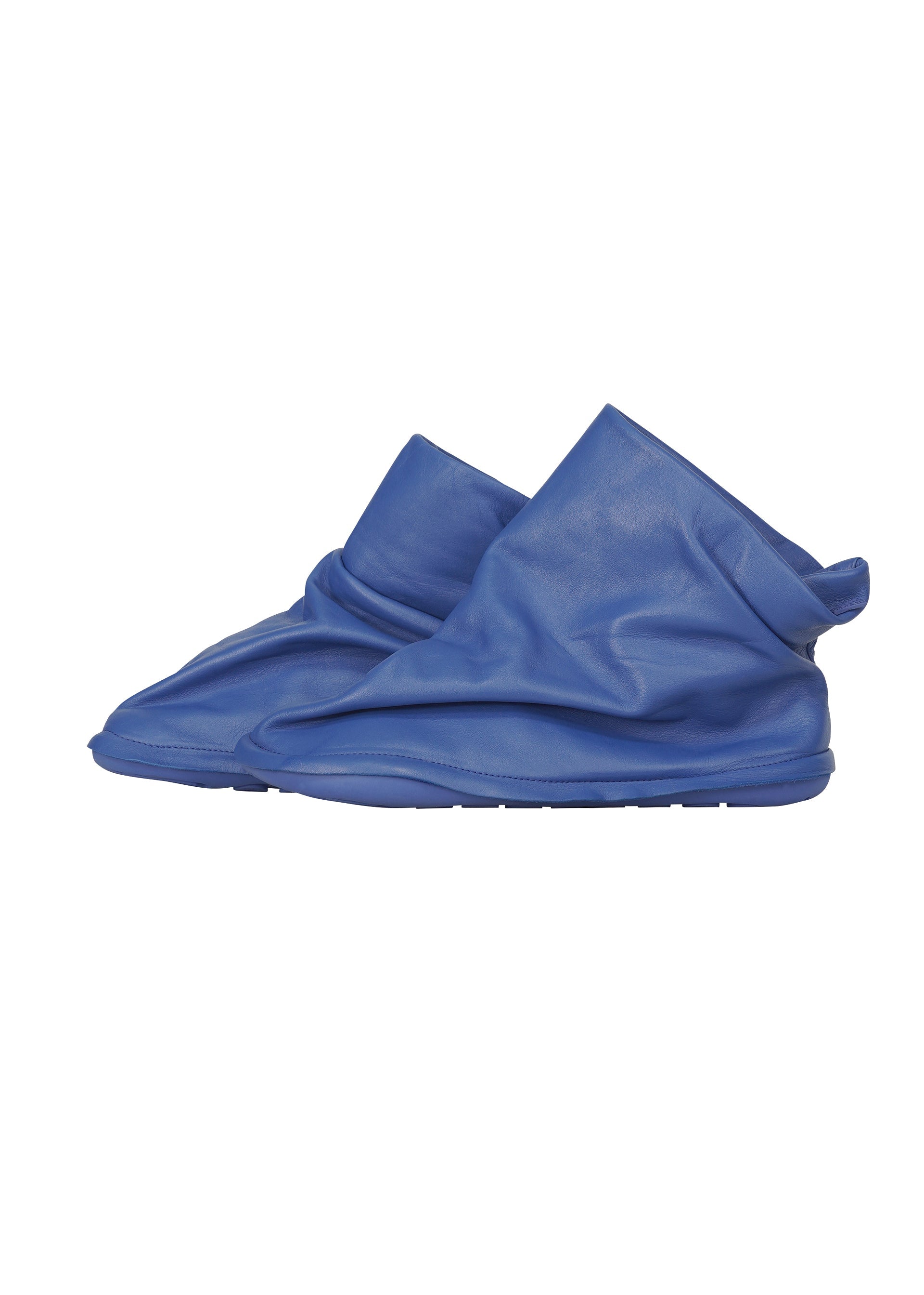 A detail shot of the ISSEY MIYAKE PEU FORM shoes.