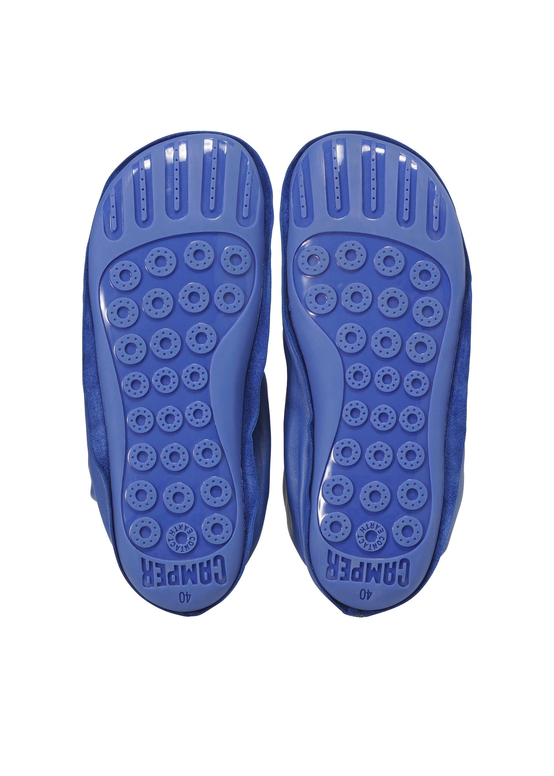 A detail shot of the ISSEY MIYAKE PEU FORM shoes.