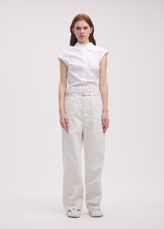 A model wears the ISSEY MIYAKE SCULPTURAL trousers.