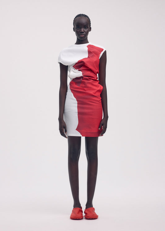 A model wears the ISSEY MIYAKE KNIT (AS REPRESENTED) dress.