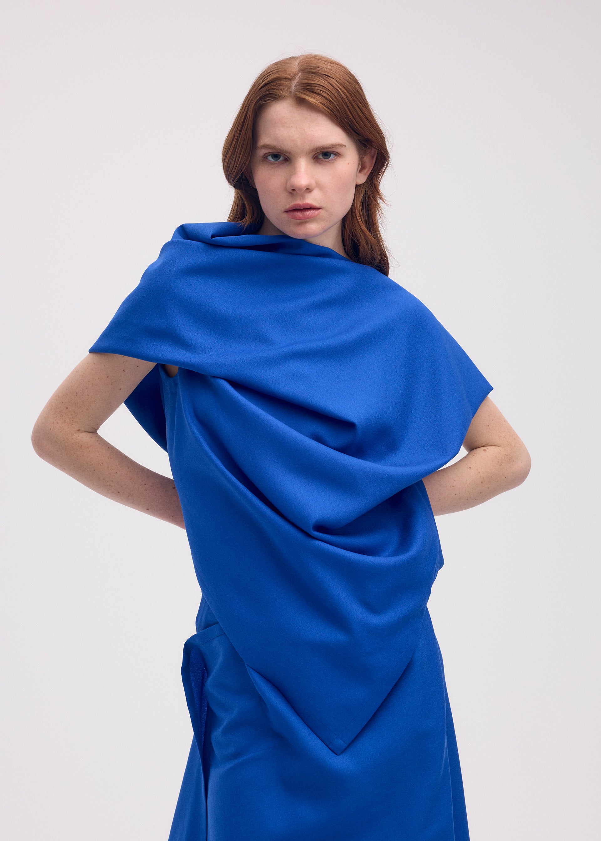 A model wears the ISSEY MIYAKE UNI FORM (WOOL) shirt.