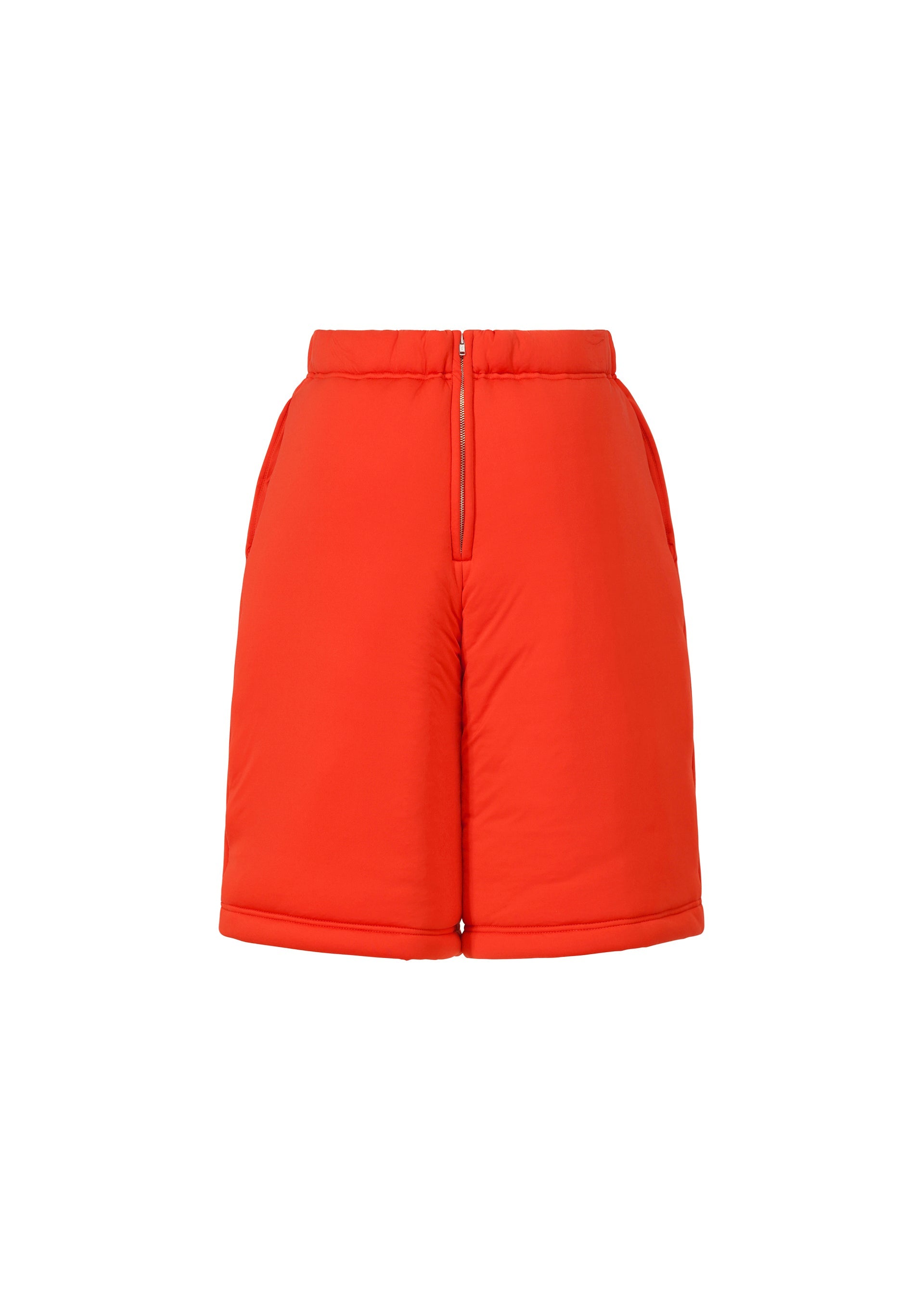 A detail shot of the ISSEY MIYAKE PUMPED T trousers.