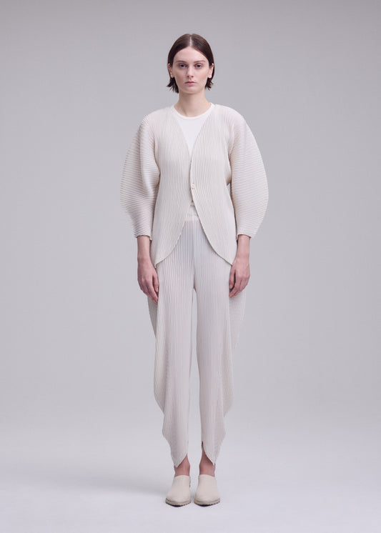 A model wears the ISSEY MIYAKE LEAF PLEATS leaf-pleats-cardigan-off-white.
