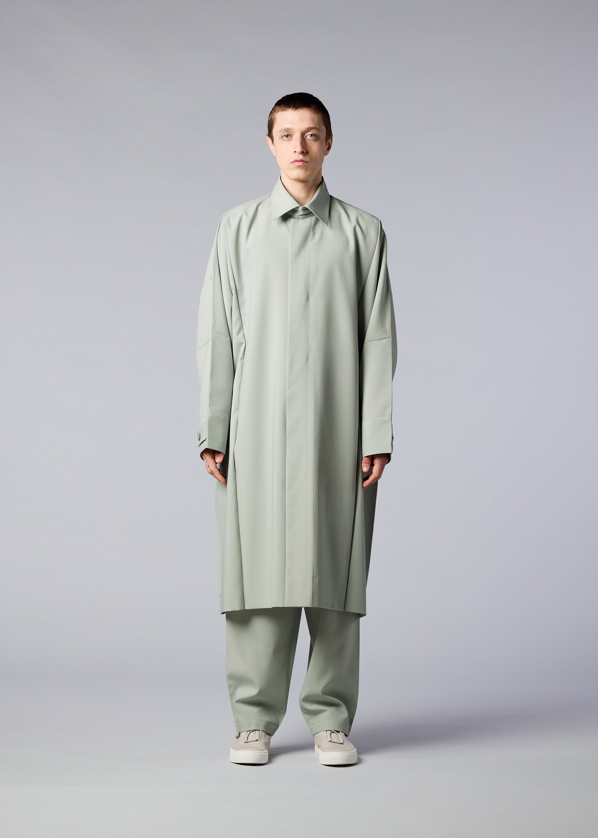 A model wears the IM MEN FLAT coat