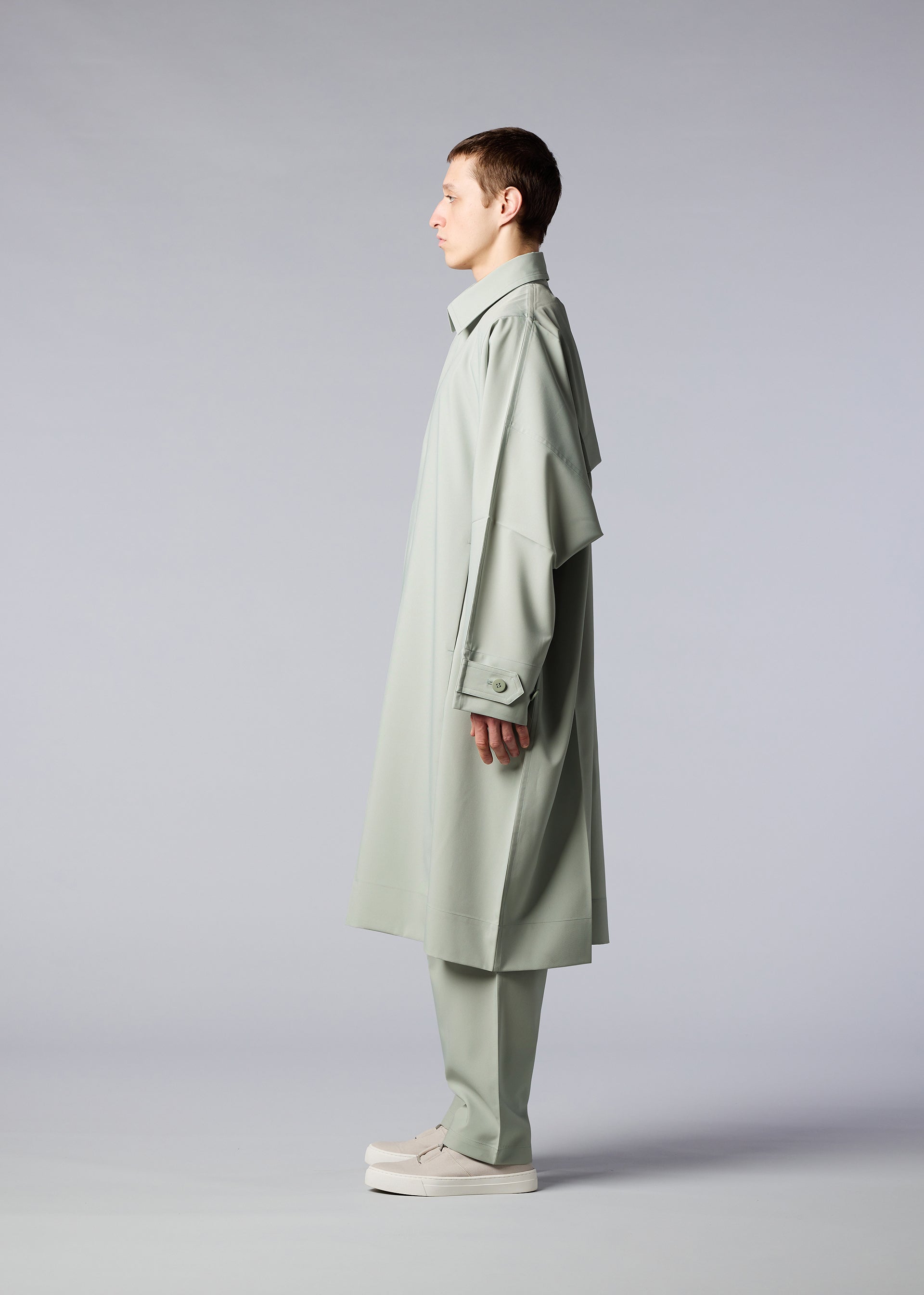 A model wears the IM MEN FLAT coat