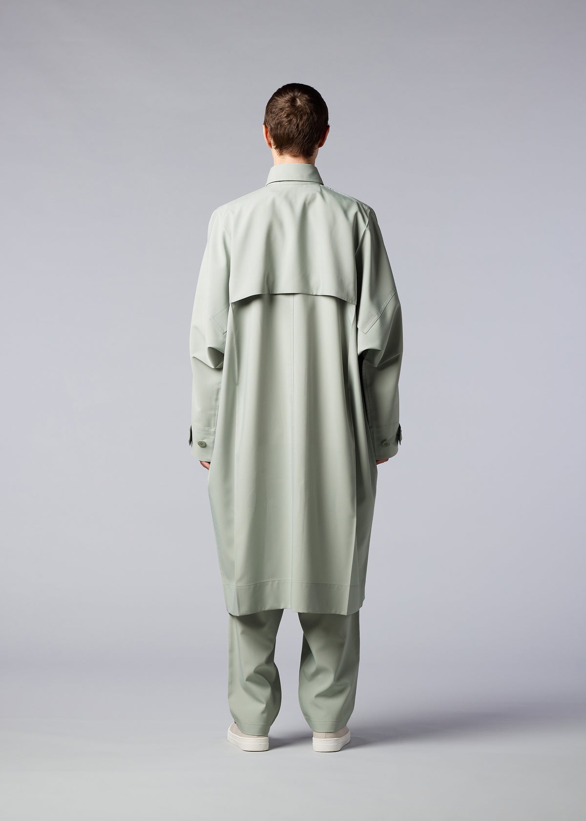 A model wears the IM MEN FLAT coat