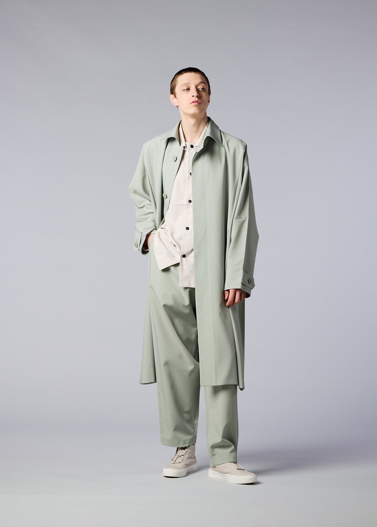A model wears the IM MEN FLAT coat