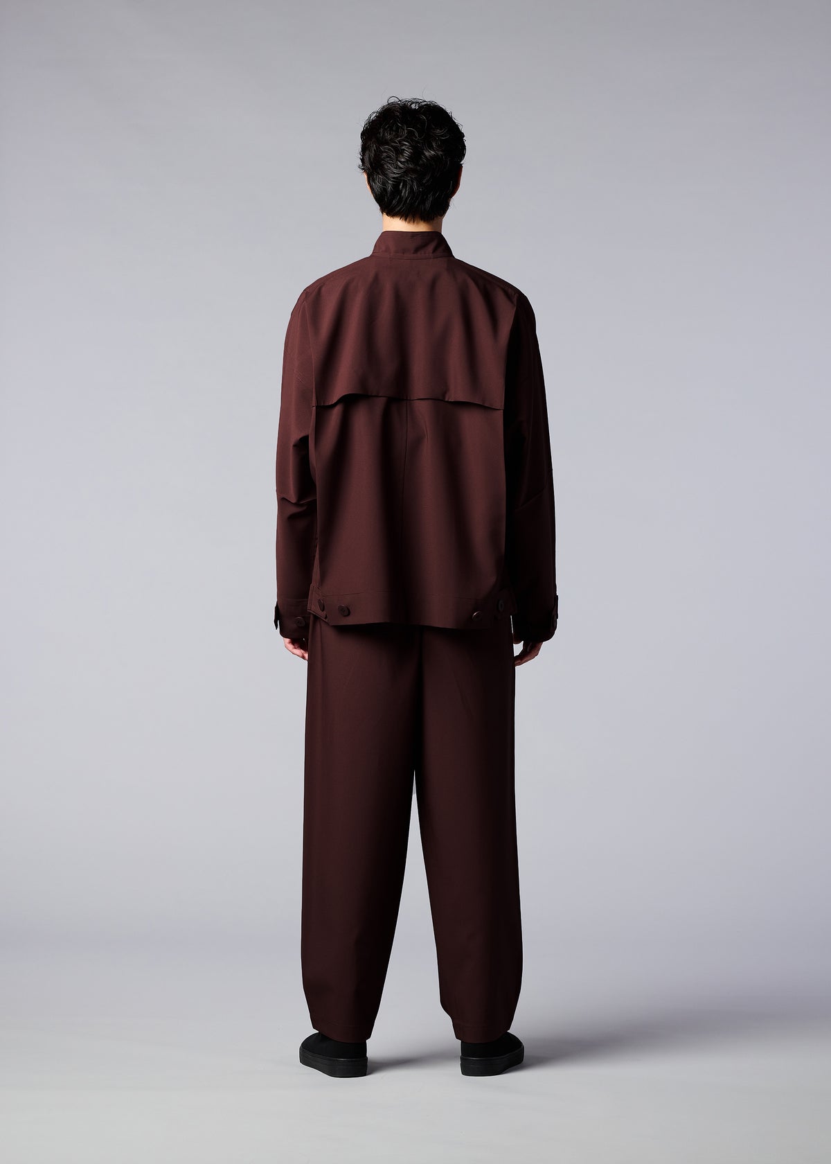 A model wears the IM MEN FLAT jacket