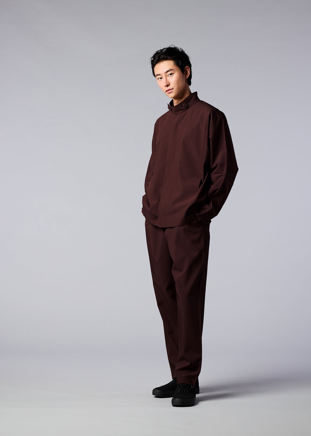 A model wears the IM MEN FLAT jacket