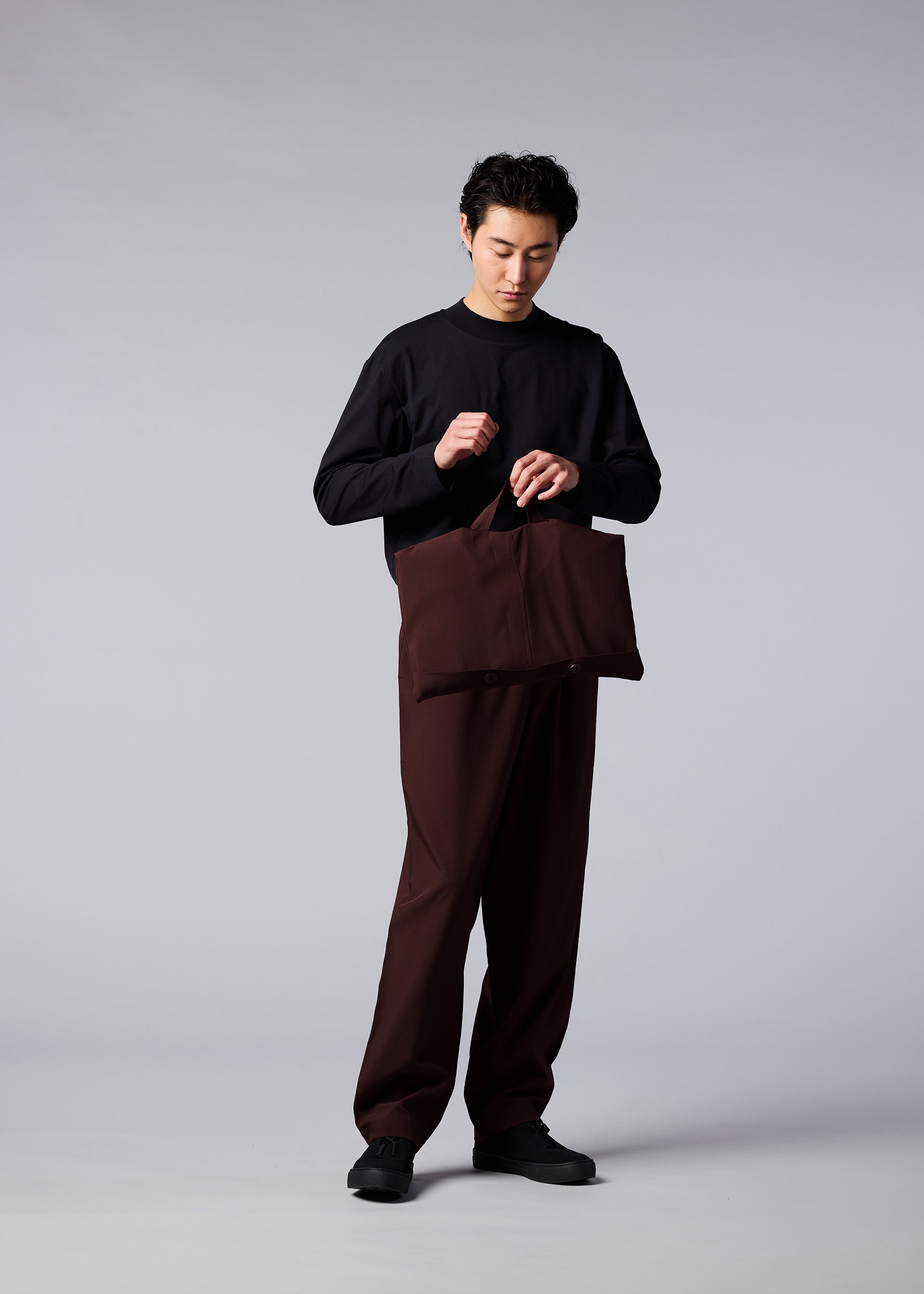 A model wears the IM MEN FLAT jacket
