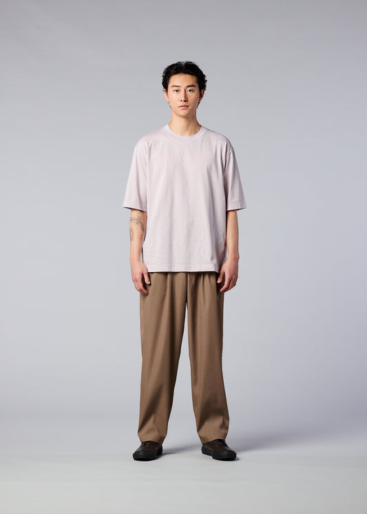 A model wears the IM MEN AIR trousers