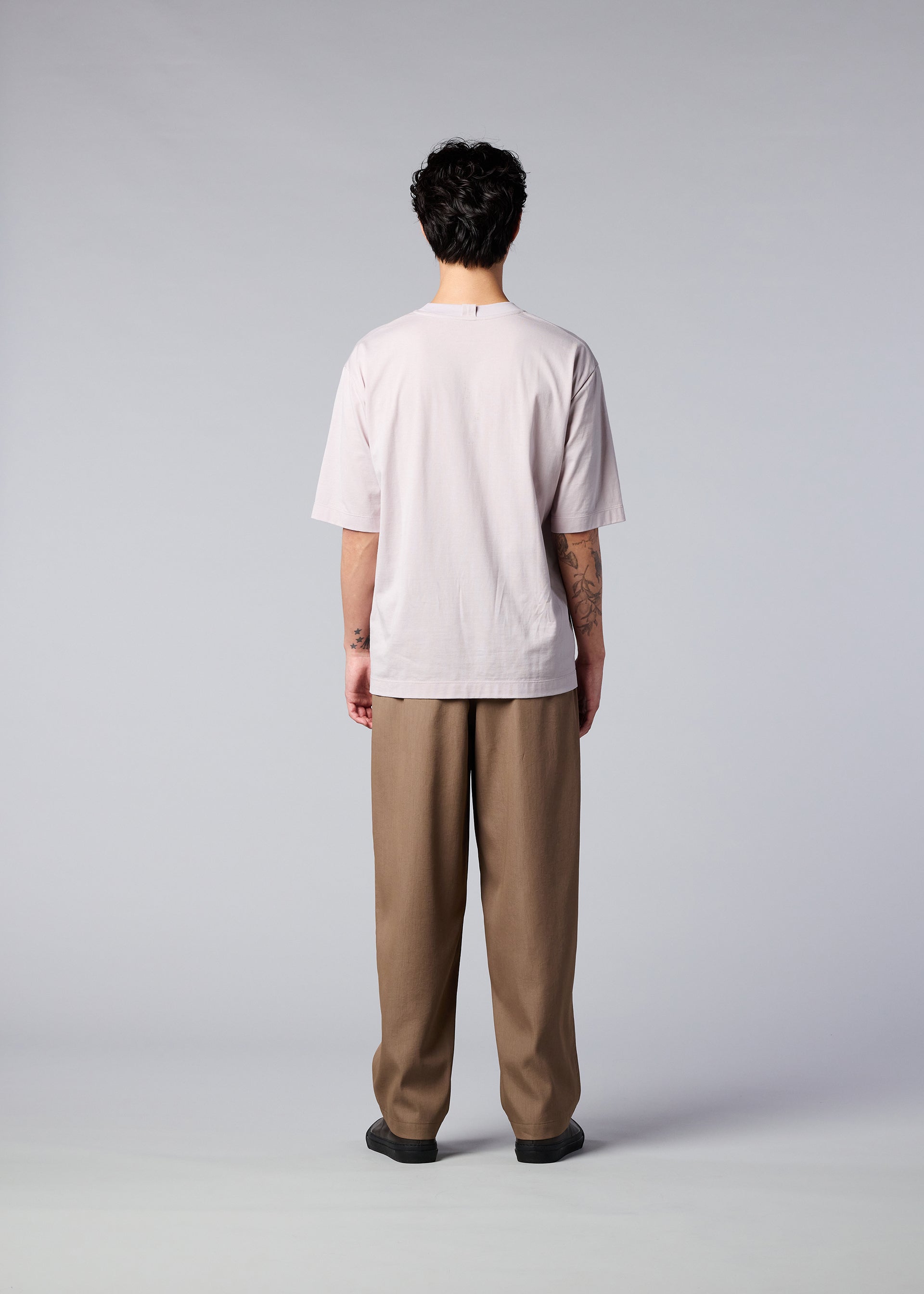 A model wears the IM MEN AIR trousers