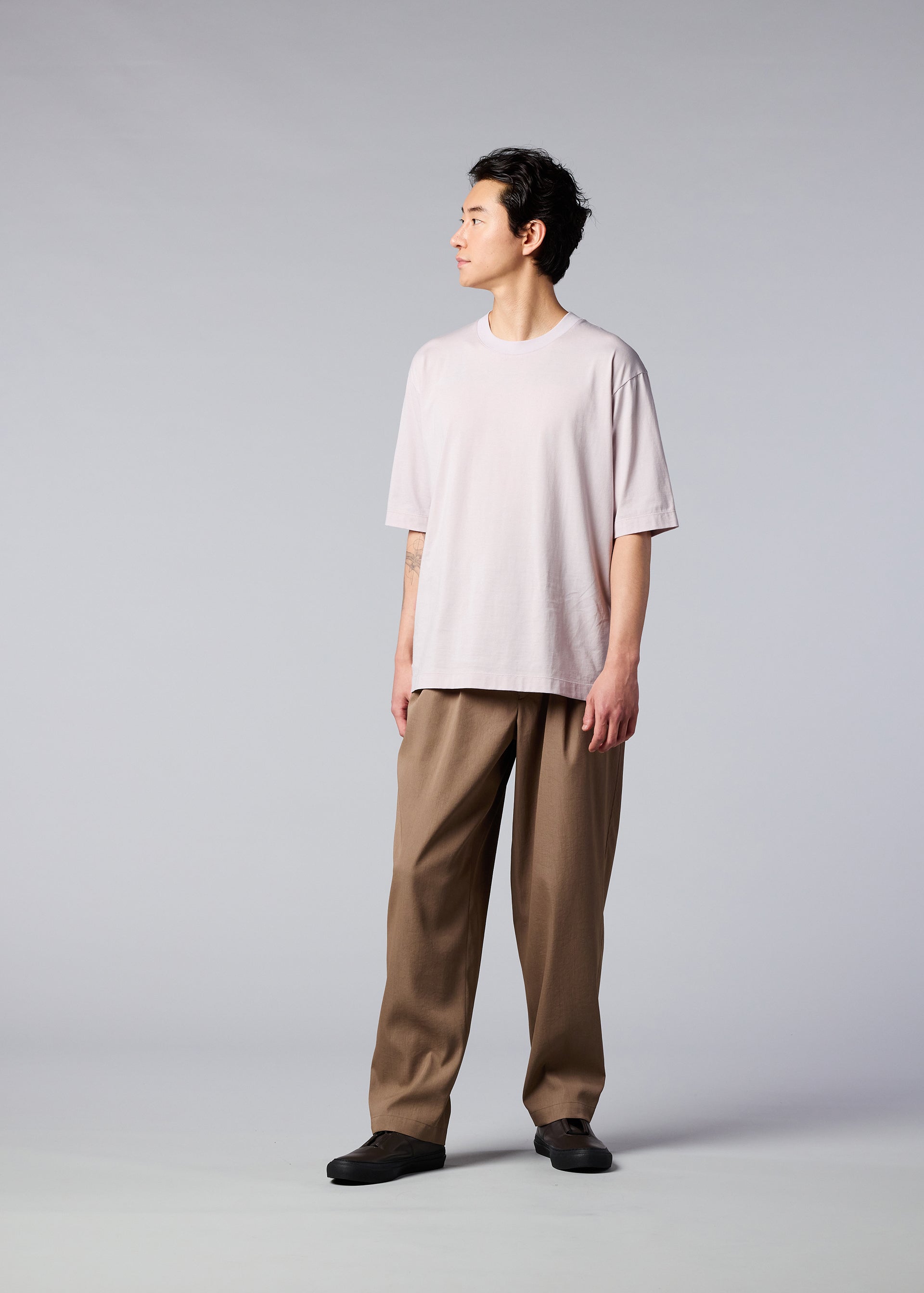 A model wears the IM MEN AIR trousers