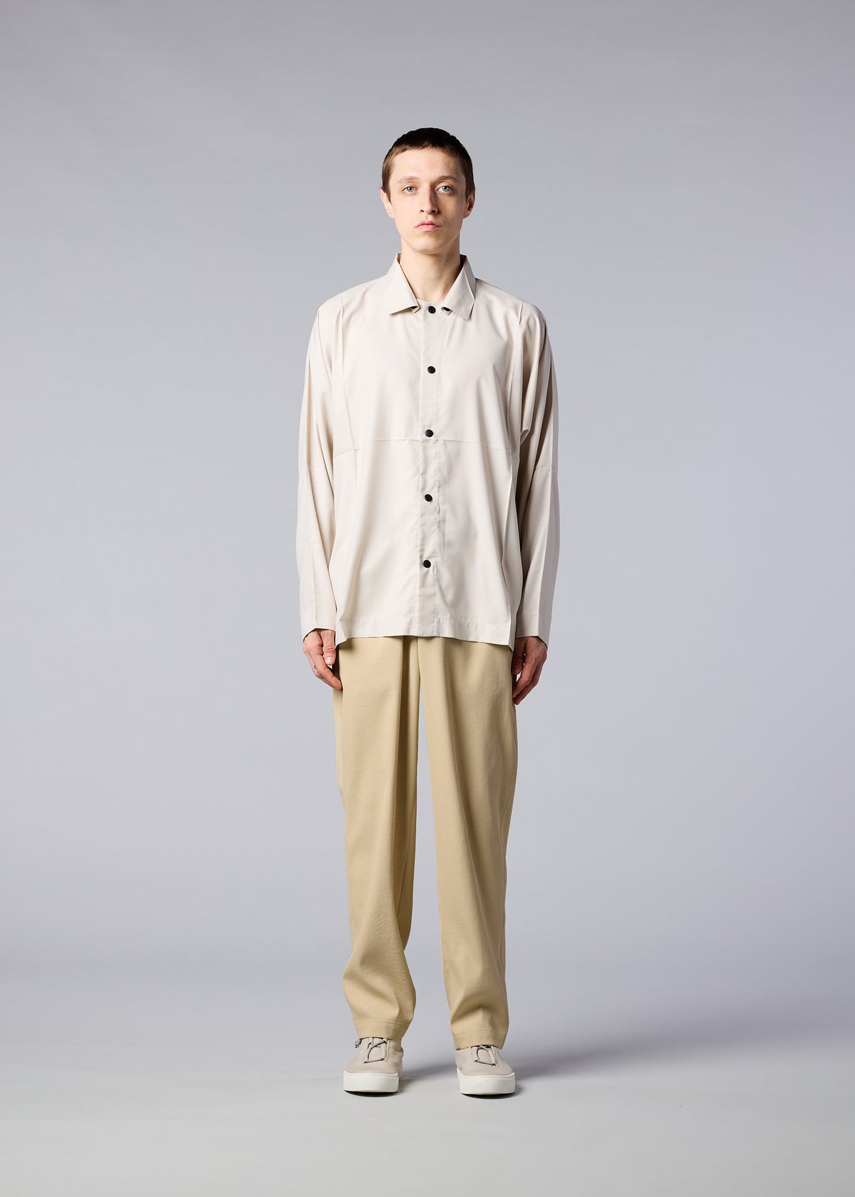 A model wears the IM MEN AIR trousers
