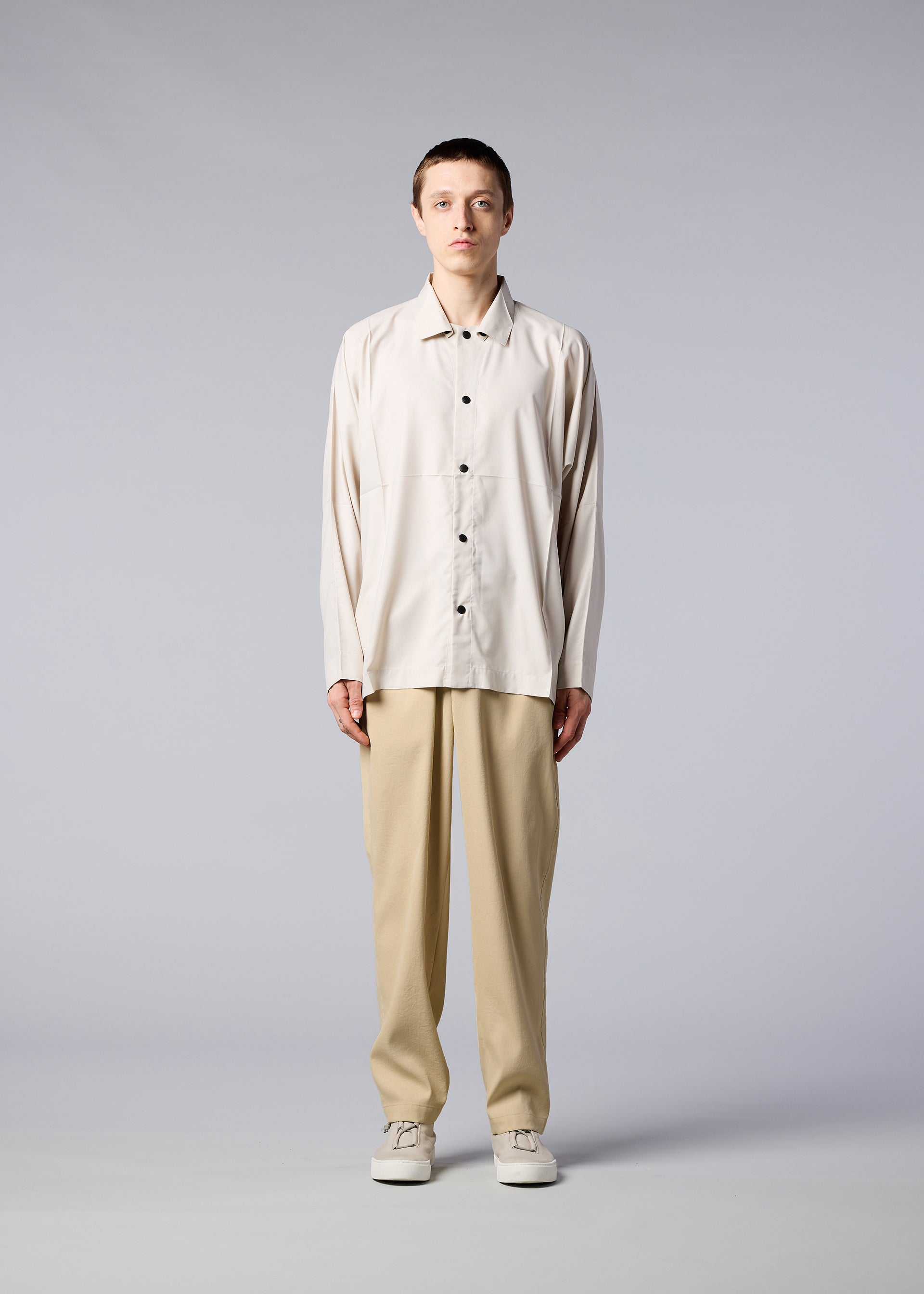 A model wears the IM MEN AIR trousers