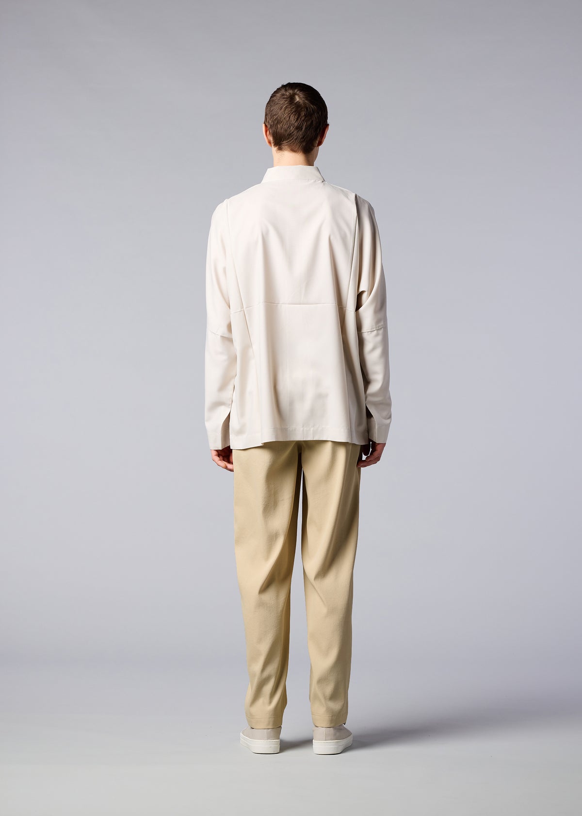 A model wears the IM MEN AIR trousers