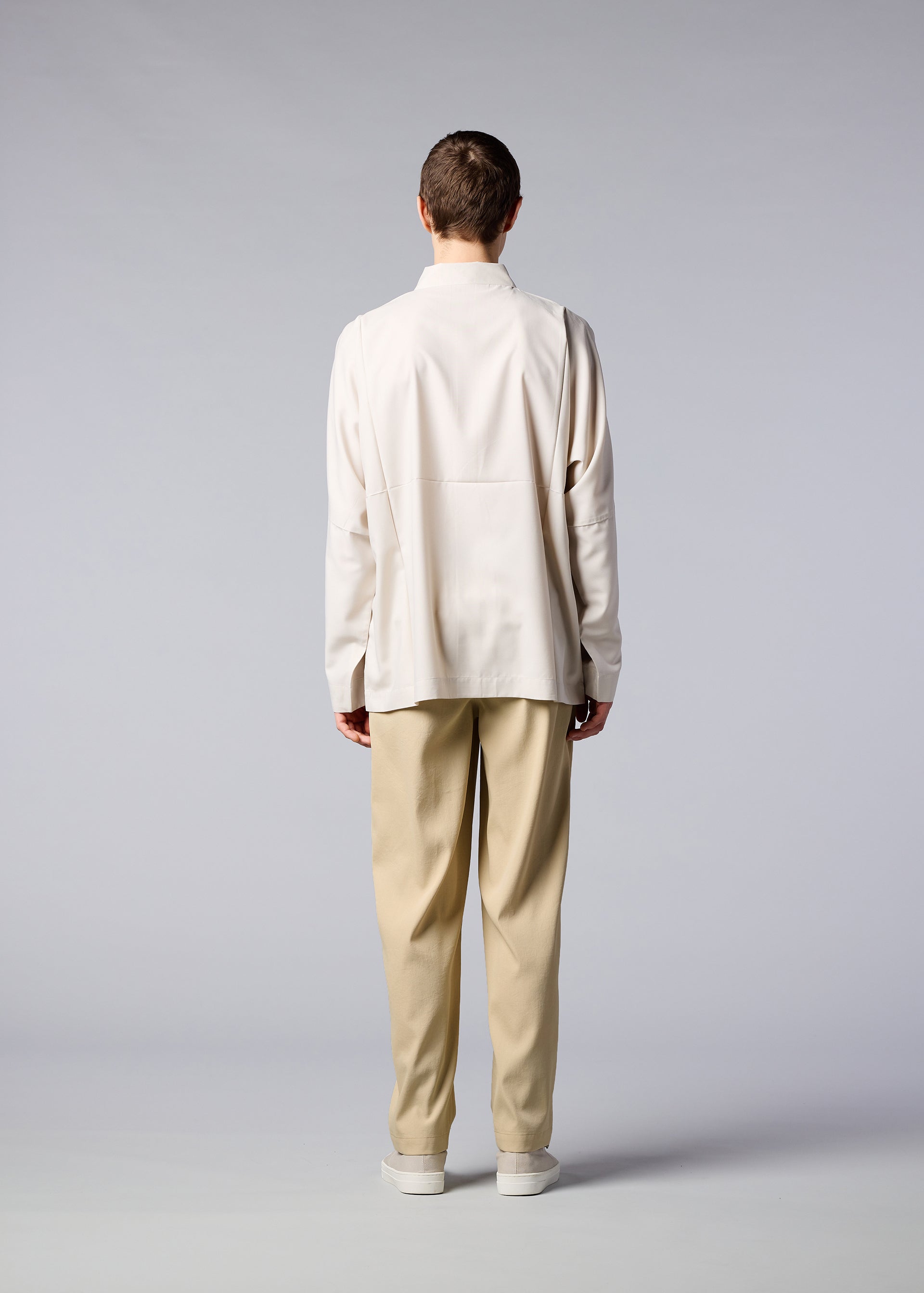 A model wears the IM MEN AIR trousers