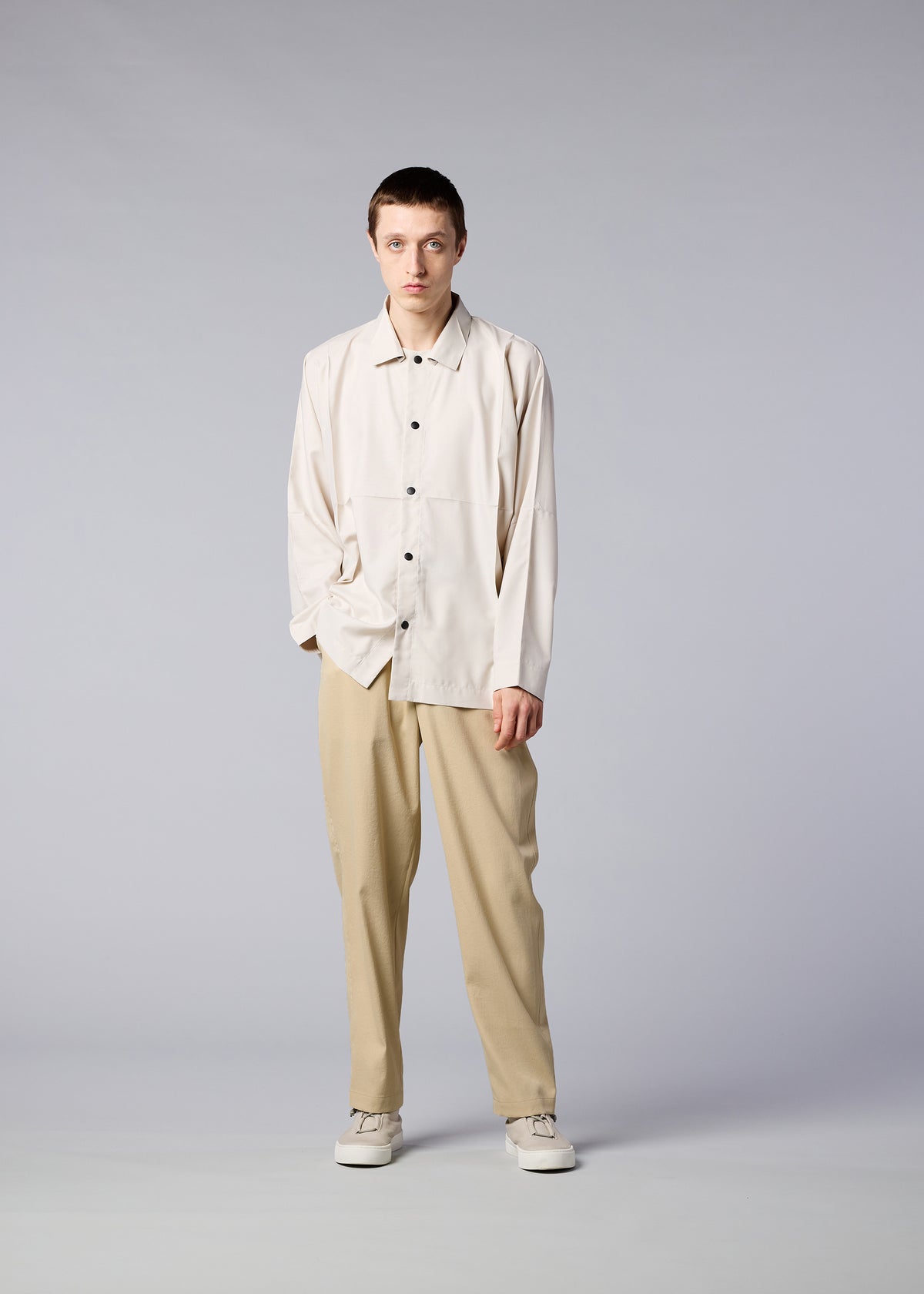 A model wears the IM MEN AIR trousers