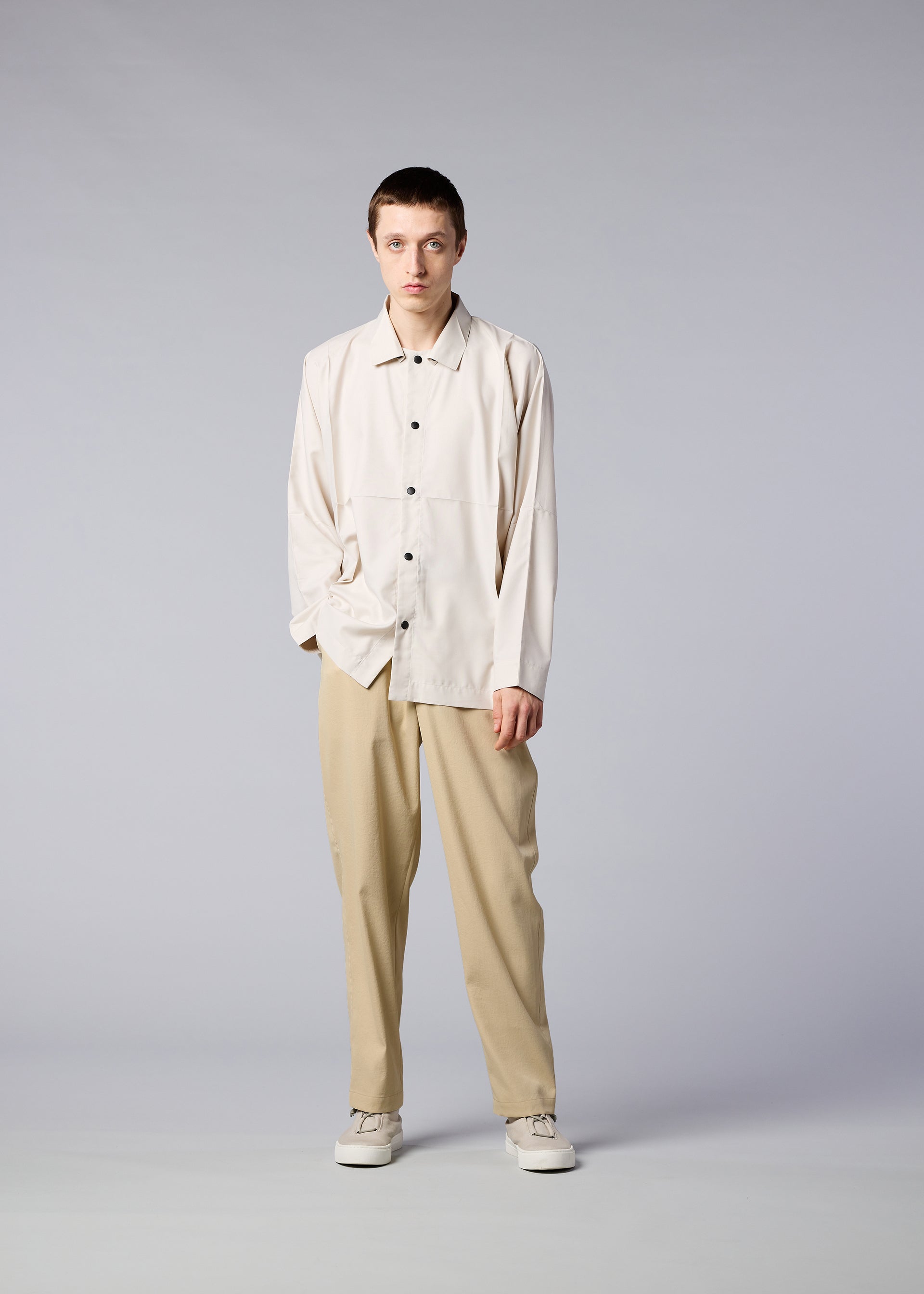 A model wears the IM MEN AIR trousers