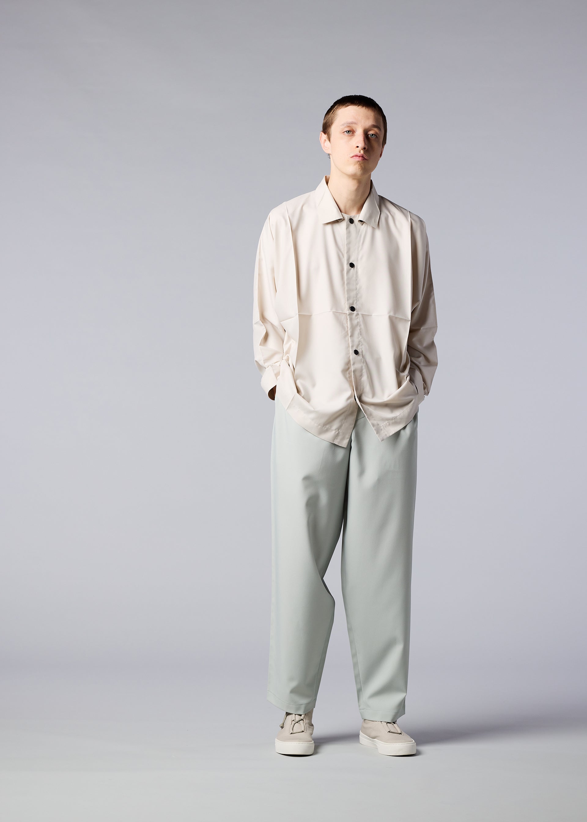 A model wears the IM MEN COMPACT SHIRT 1 shirt