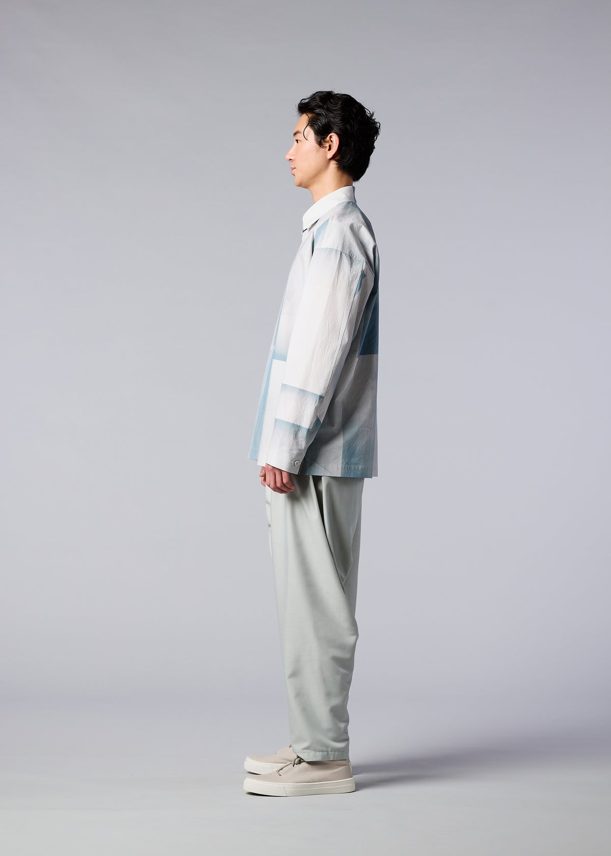 A model wears the IM MEN SIGN shirt