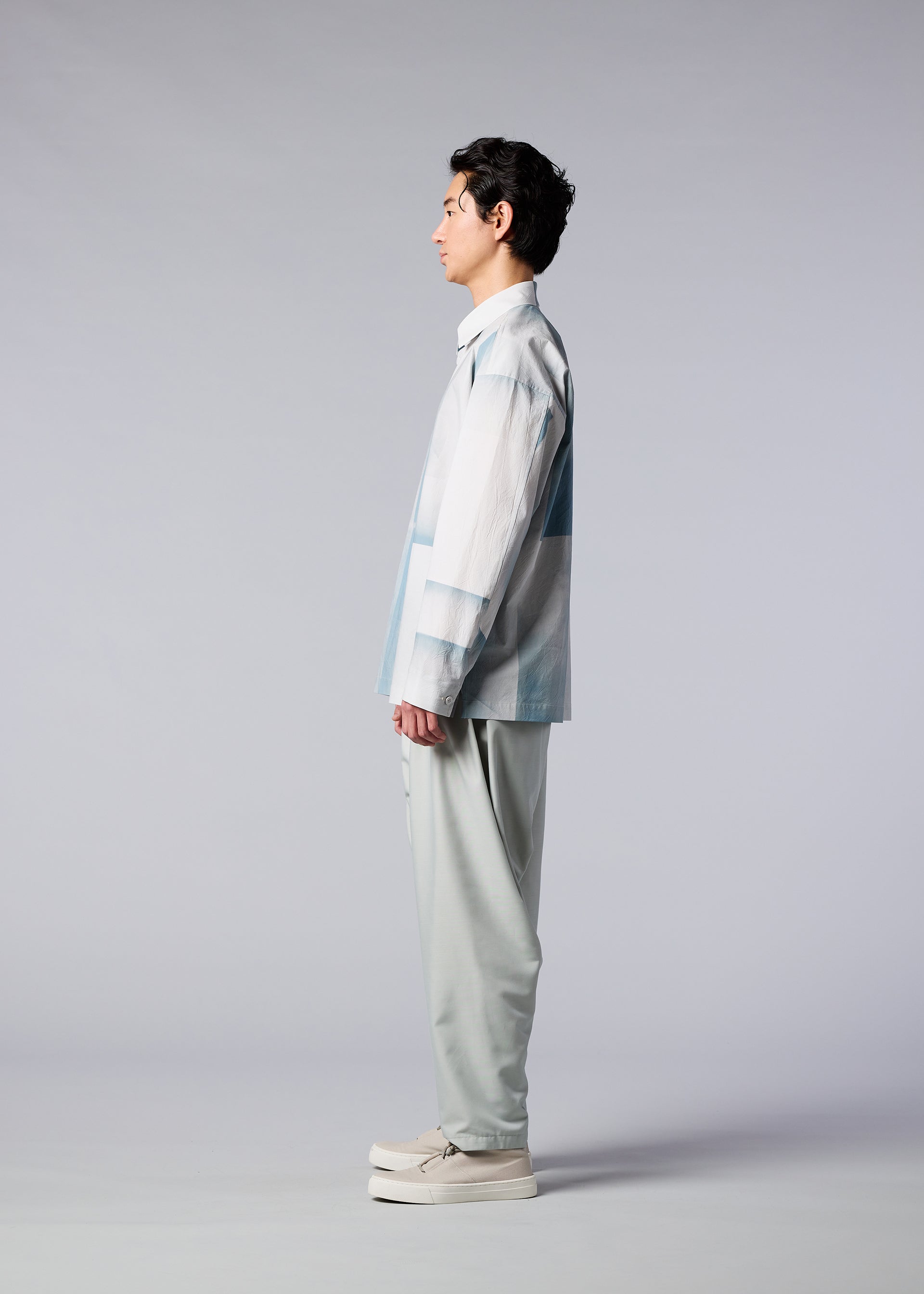 A model wears the IM MEN SIGN shirt