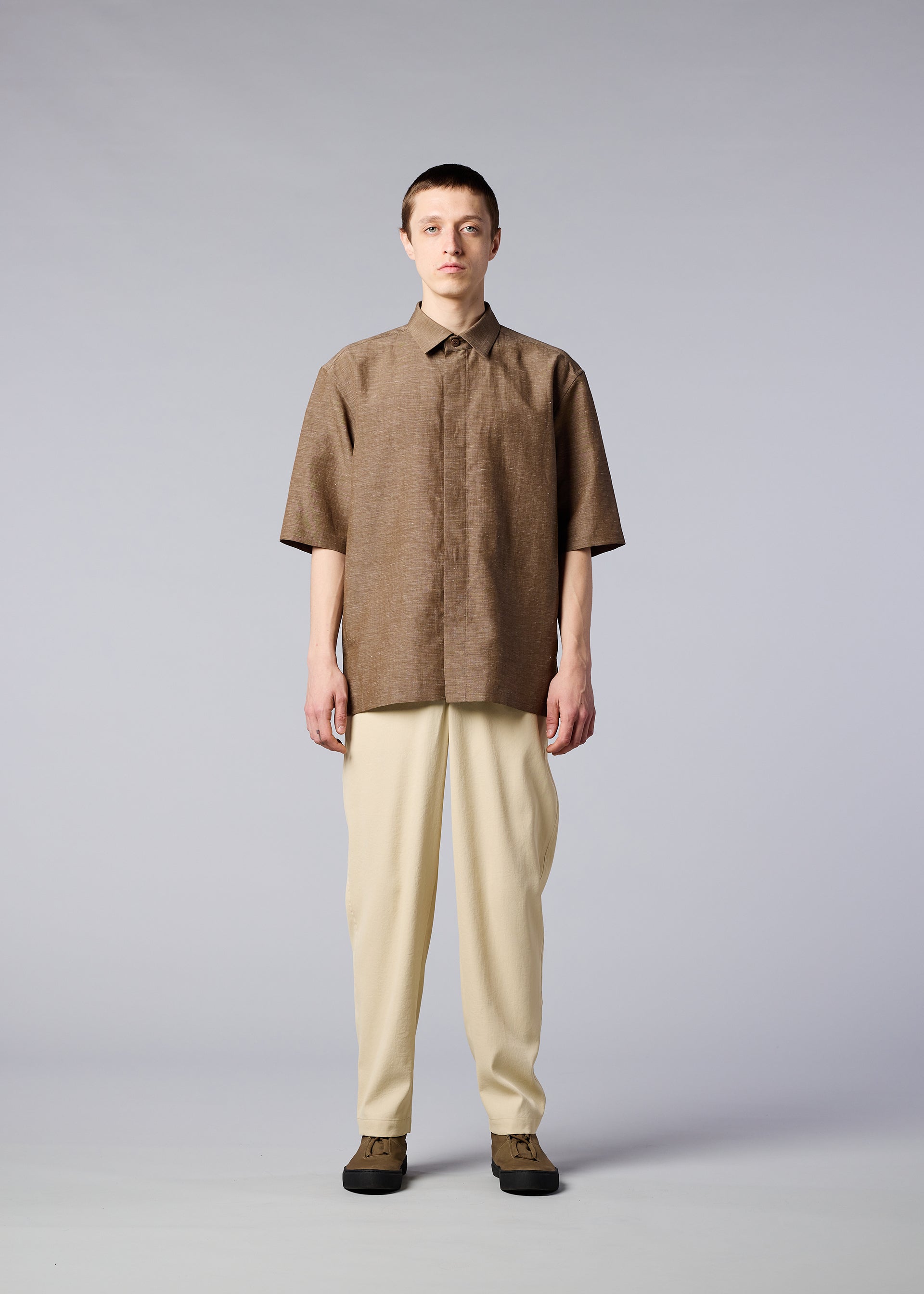A model wears the IM MEN HYBRID SHIRT shirt