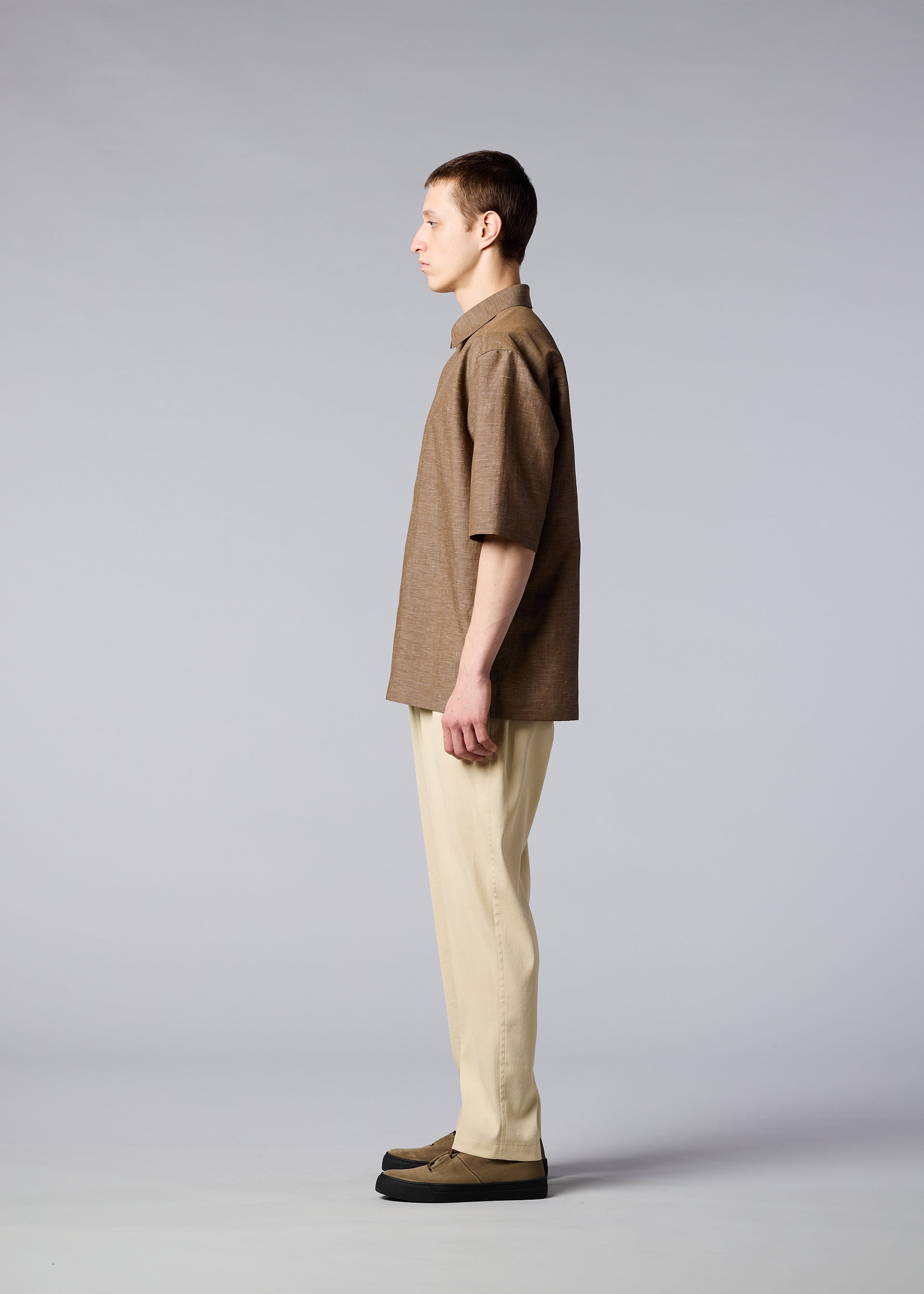 A model wears the IM MEN HYBRID SHIRT shirt