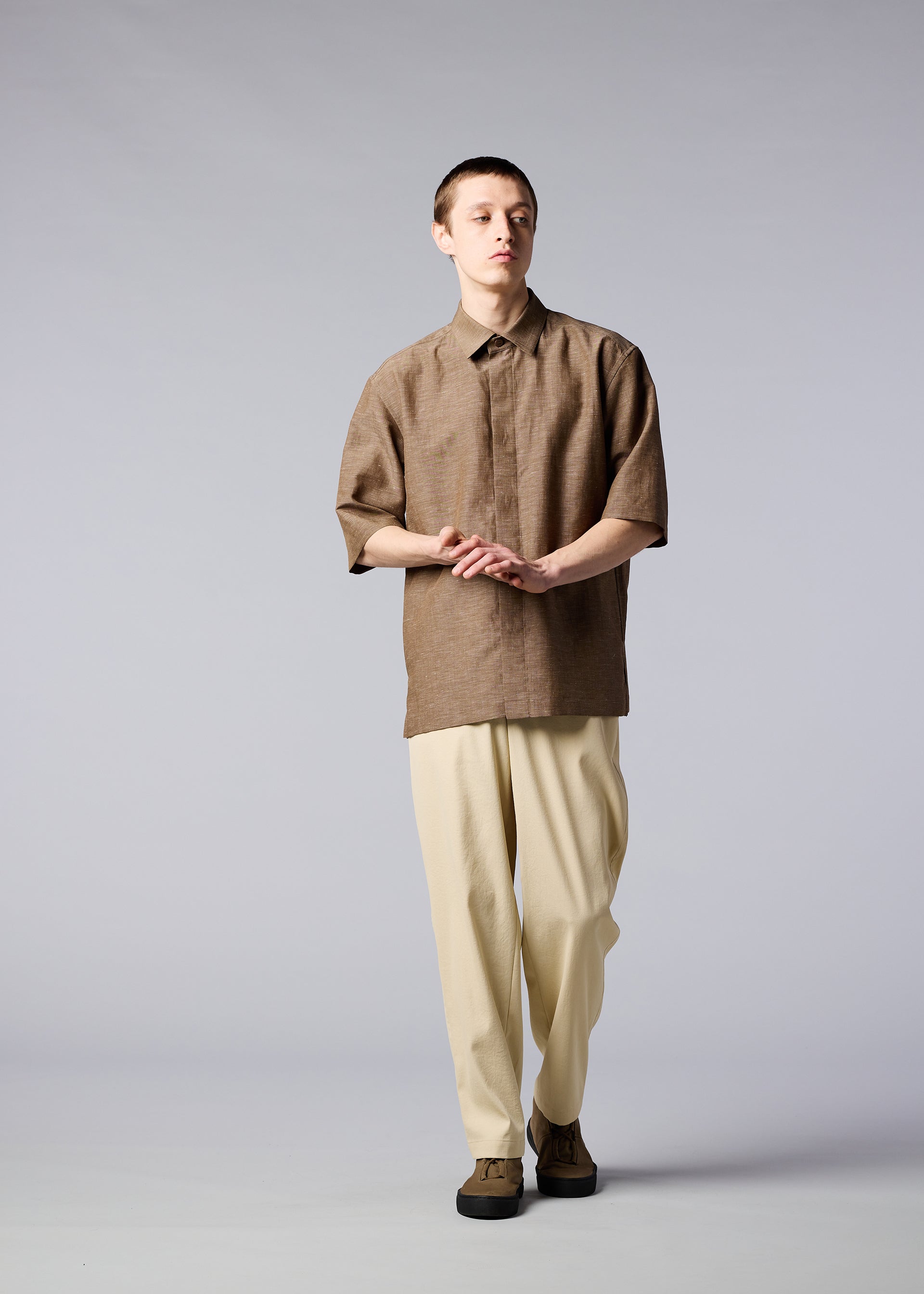A model wears the IM MEN HYBRID SHIRT shirt