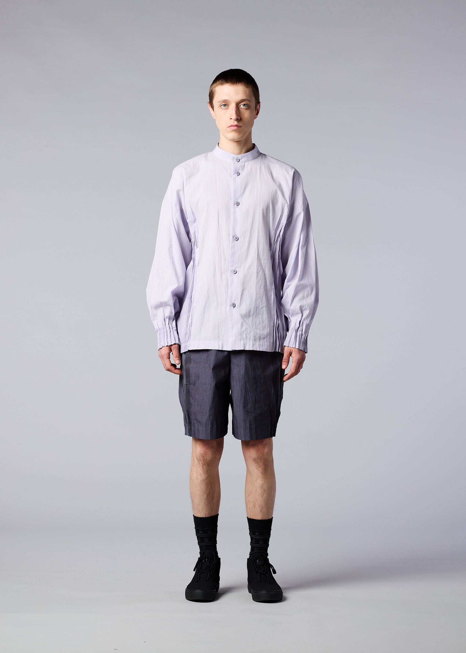 A model wears the IM MEN DUO SHIRT shirt