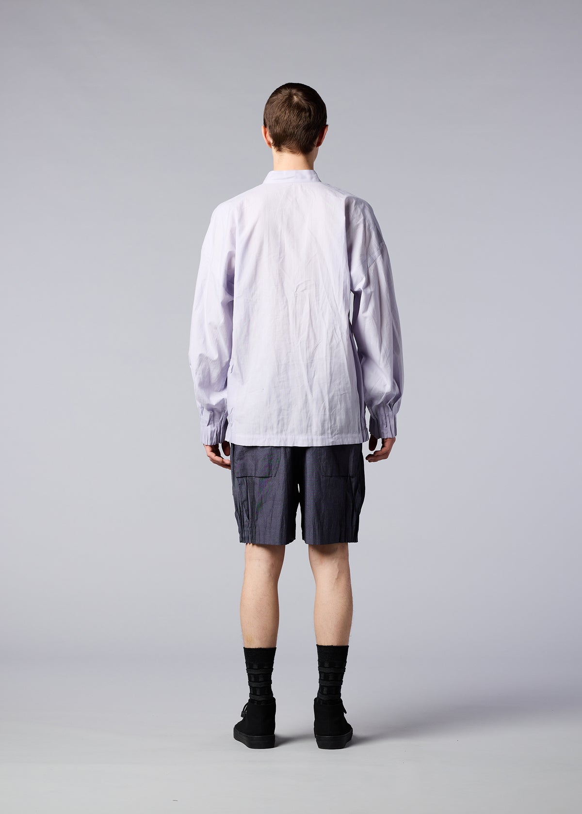 A model wears the IM MEN DUO SHIRT shirt