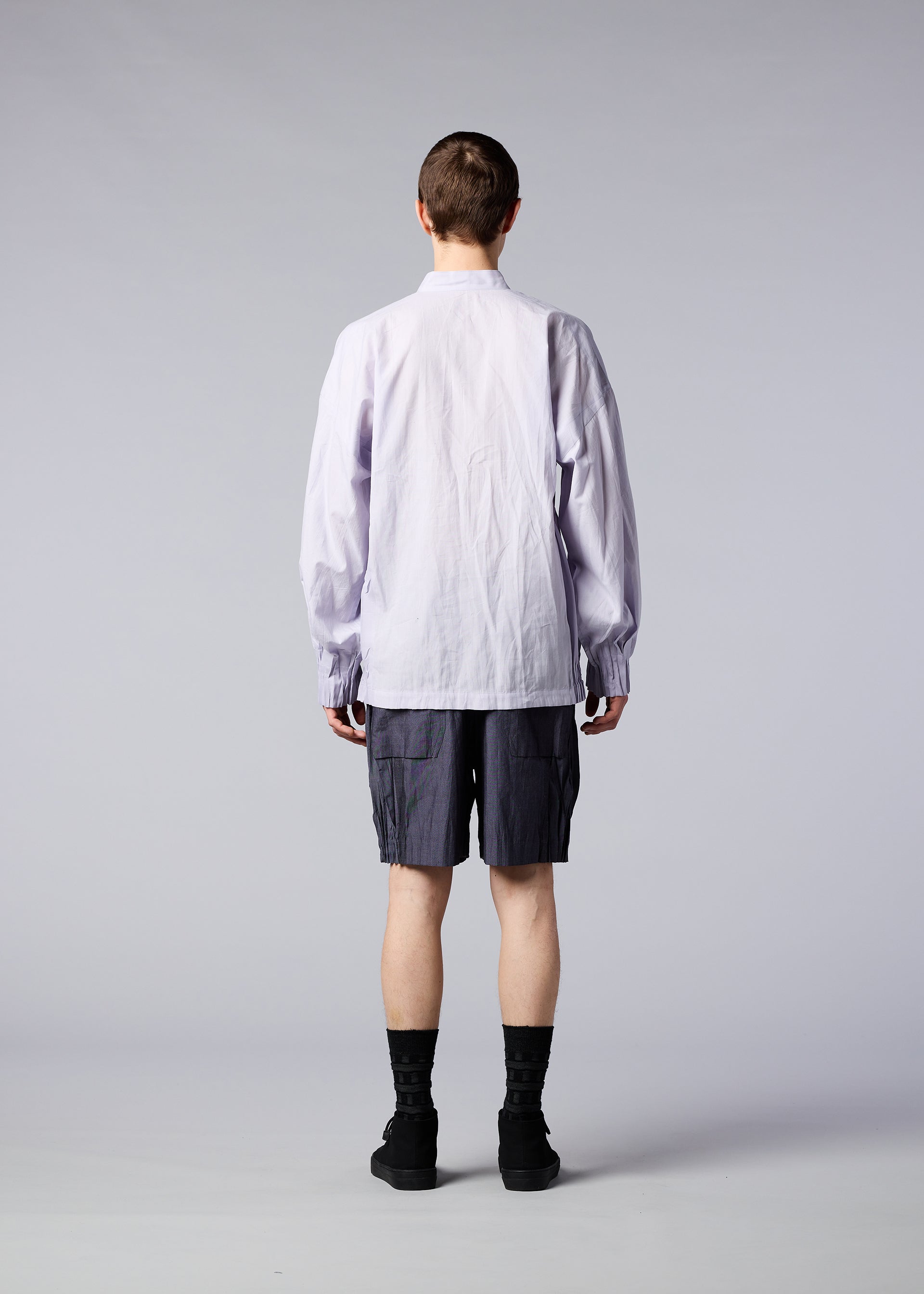 A model wears the IM MEN DUO SHIRT shirt