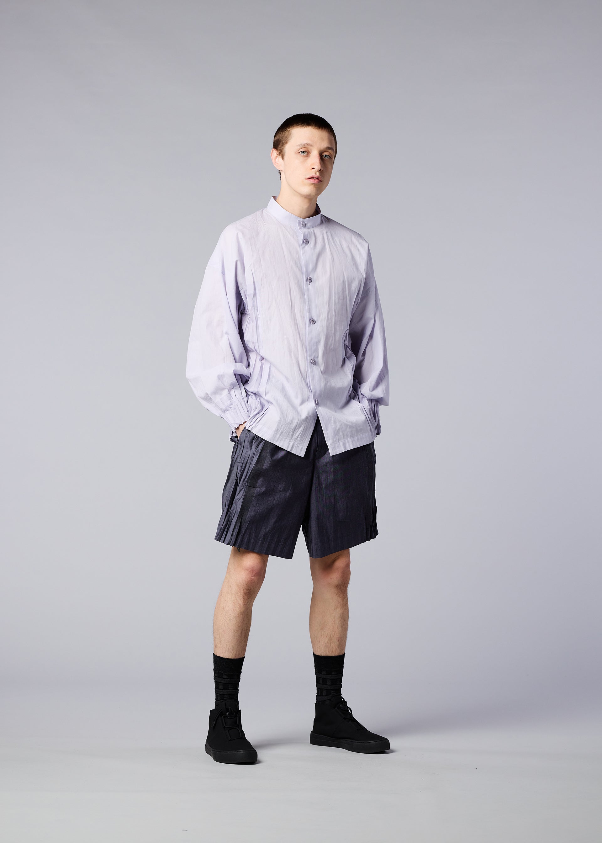 A model wears the IM MEN DUO SHIRT shirt