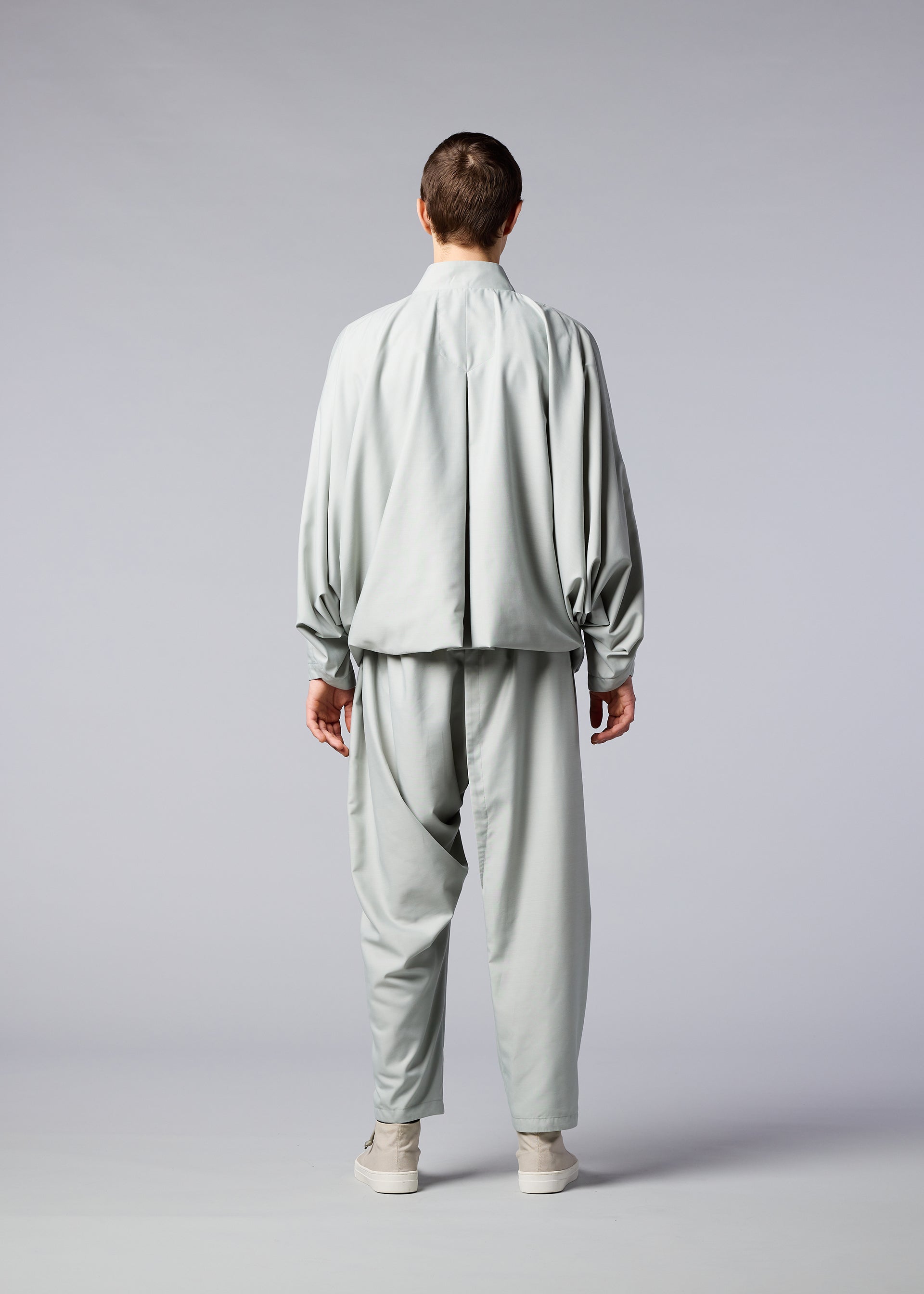A model wears the IM MEN SWING jacket