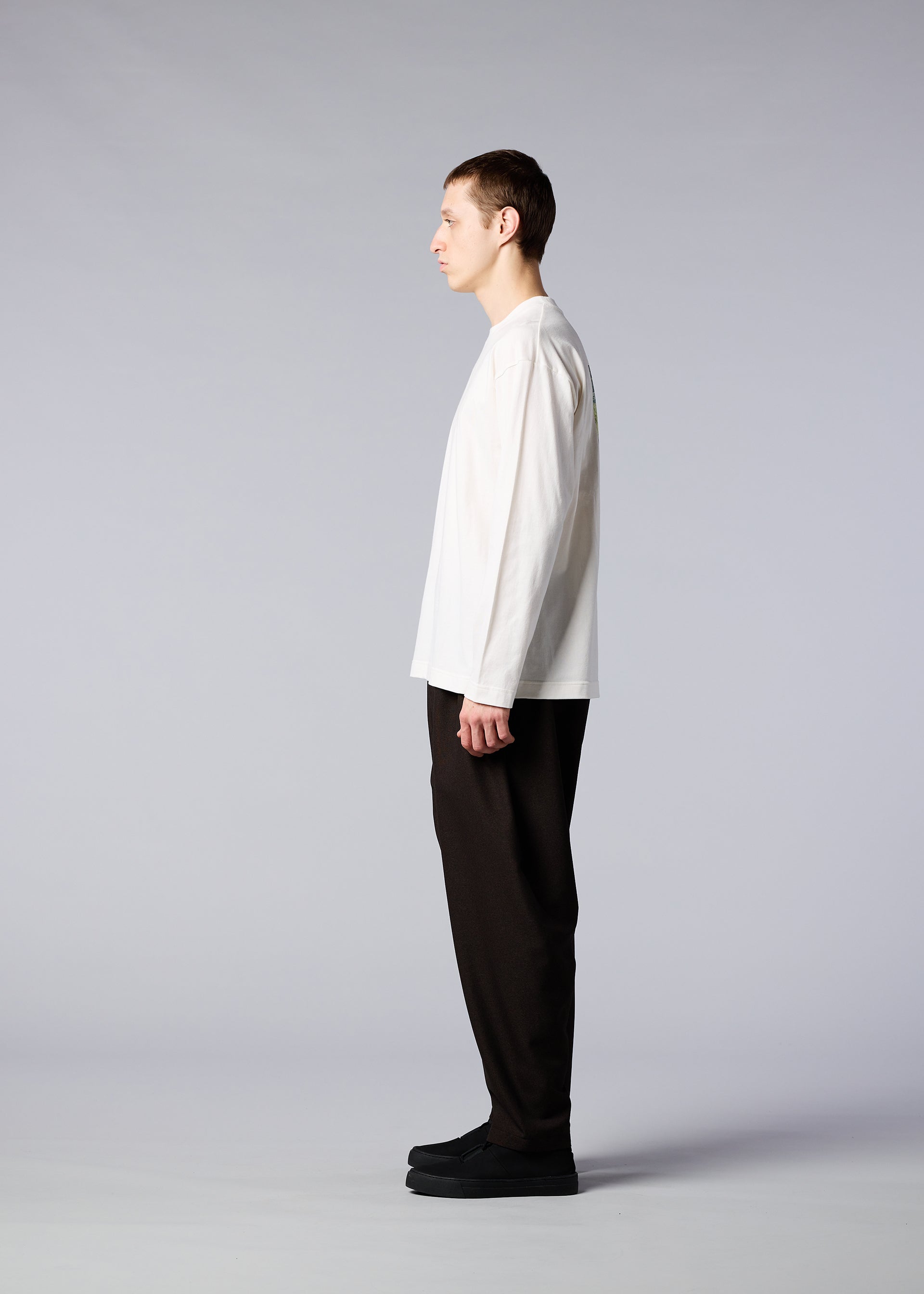 A model wears the IM MEN SOIL GRAPHIC T top.