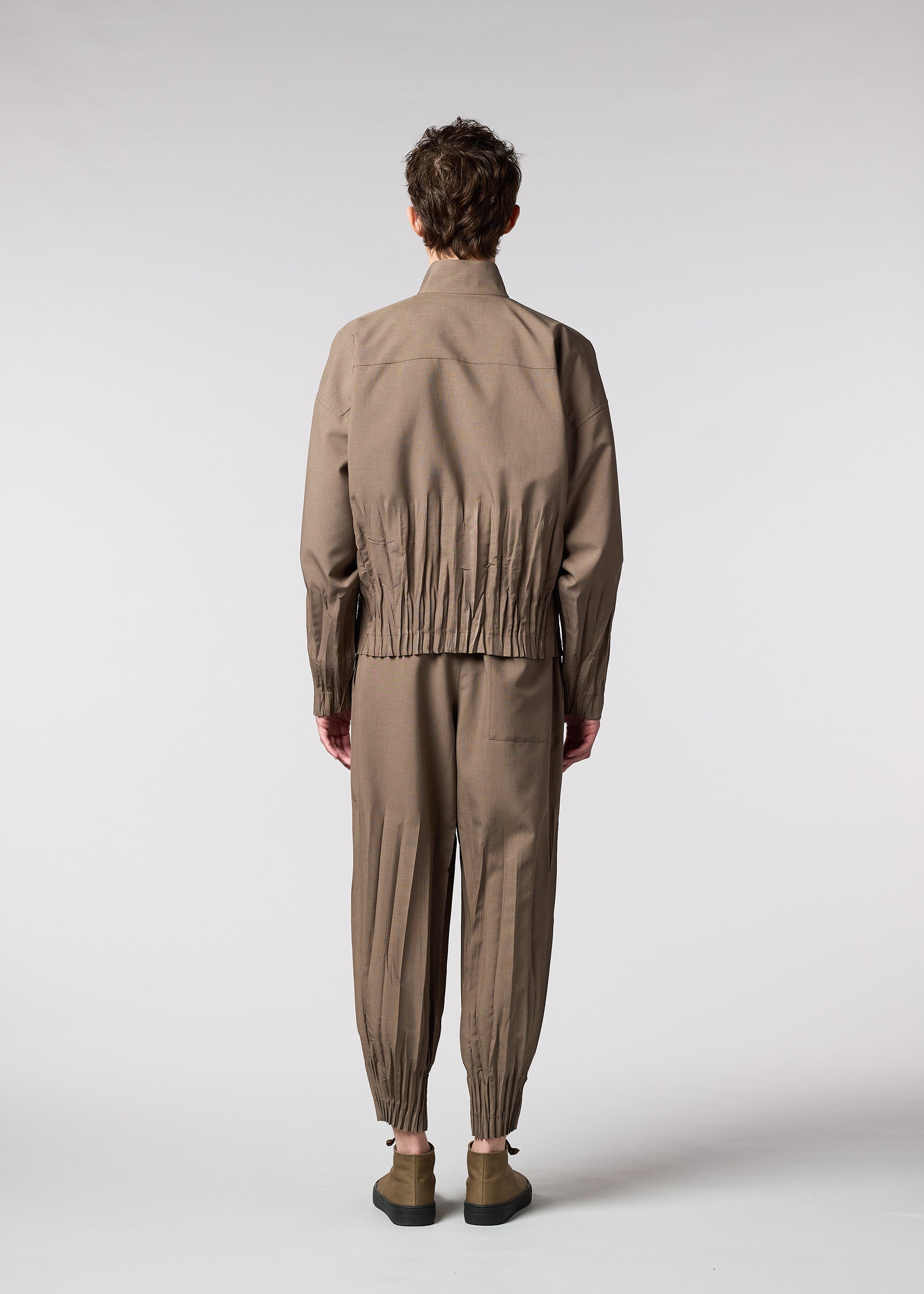 A model wears the IM MEN WAFT jacket.