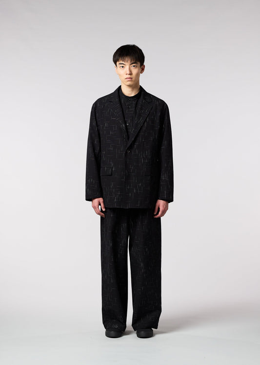 A model wears the IM MEN KASURI jacket.