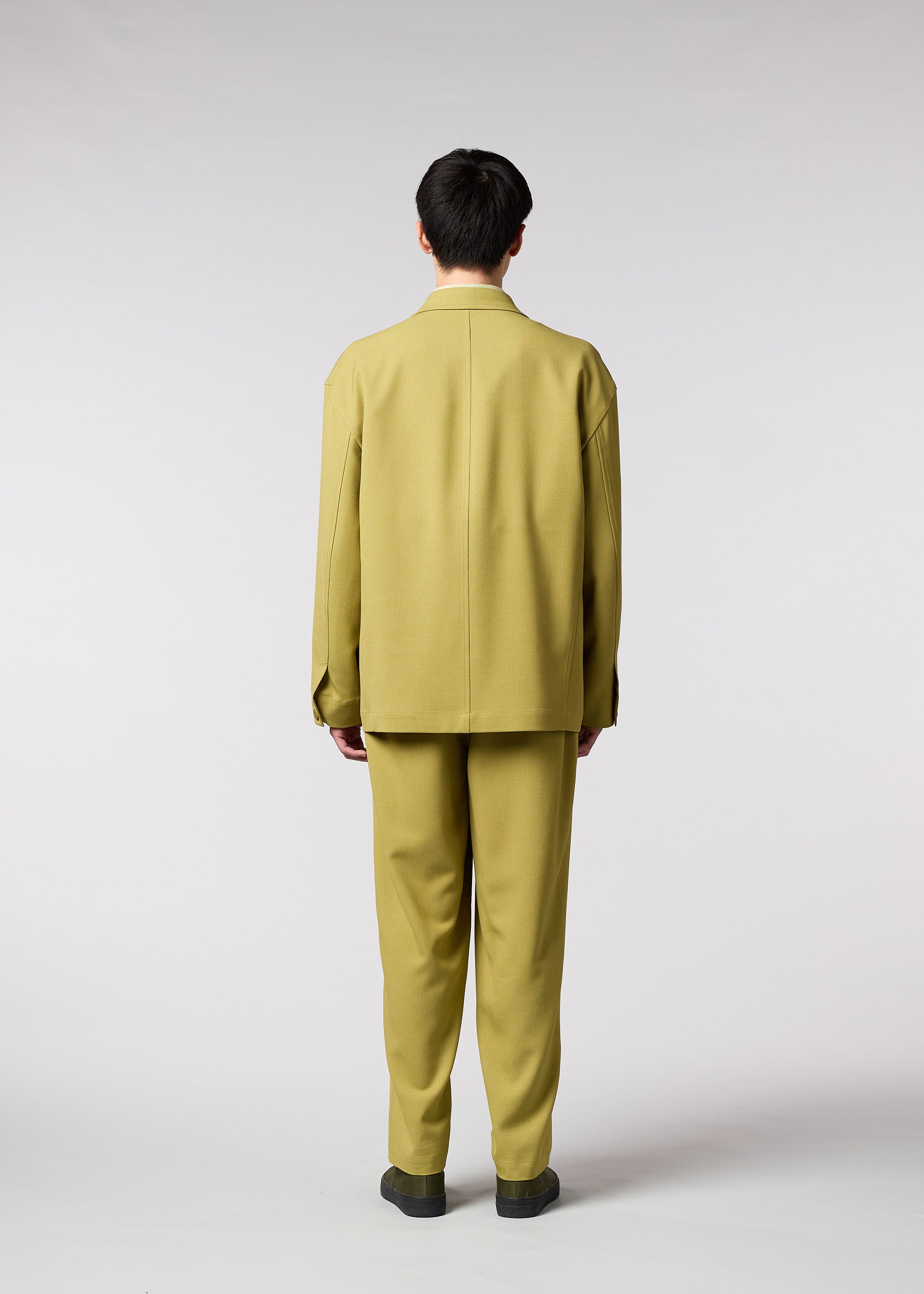 A model wears the IM MEN WARMTH trousers.