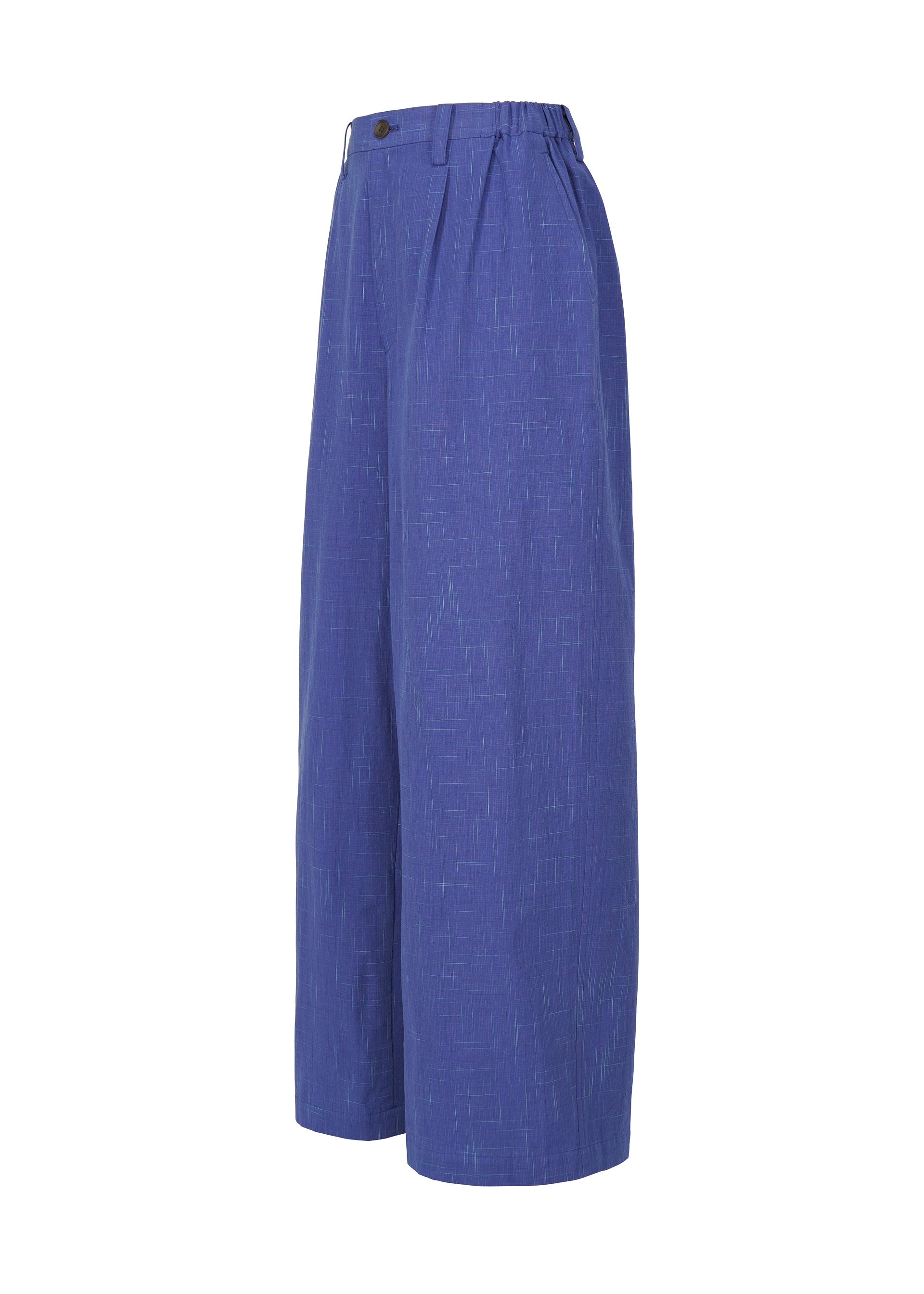 A detail shot of the IM MEN KASURI trousers.