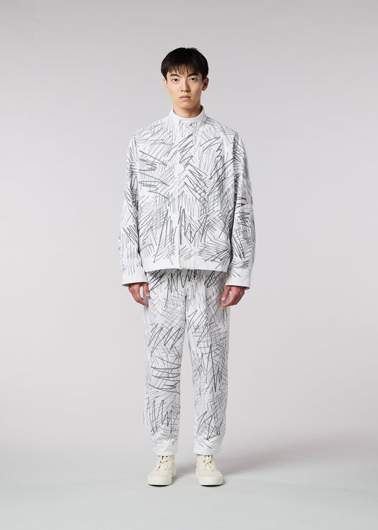 A model wears the IM MEN SKETCH trousers.