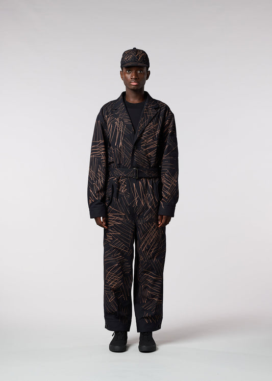 A model wears the IM MEN SKETCH jumpsuit.
