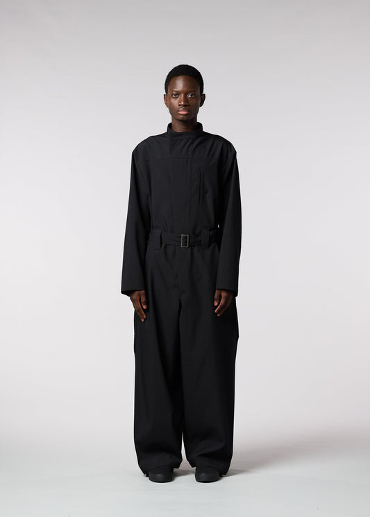 A model wears the ISSEY MIYAKE MEN WINGS jumpsuit.