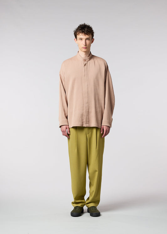 A model wears the IM MEN DOUBLE WEAVE CREPE shirt.