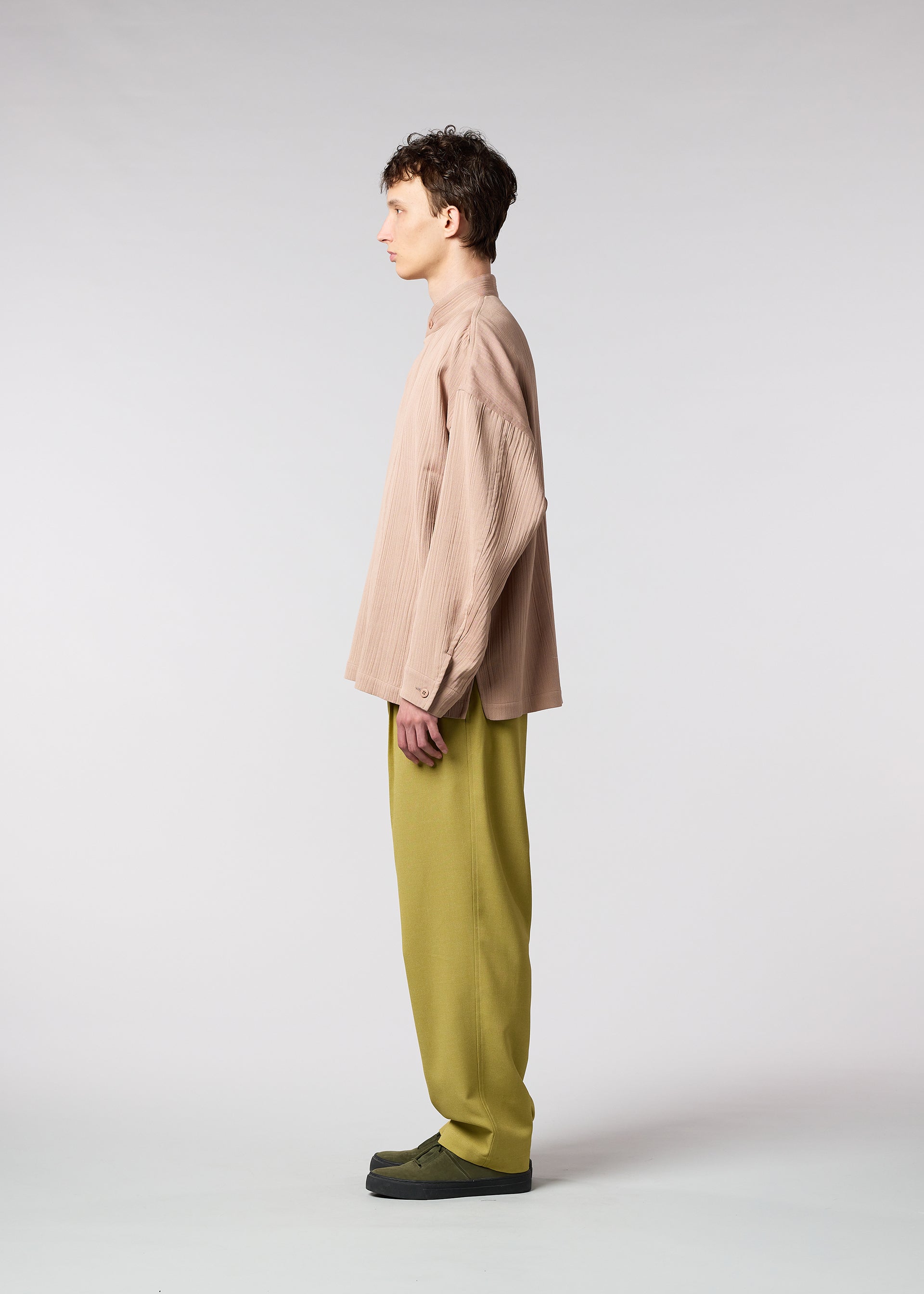 A model wears the IM MEN DOUBLE WEAVE CREPE shirt.